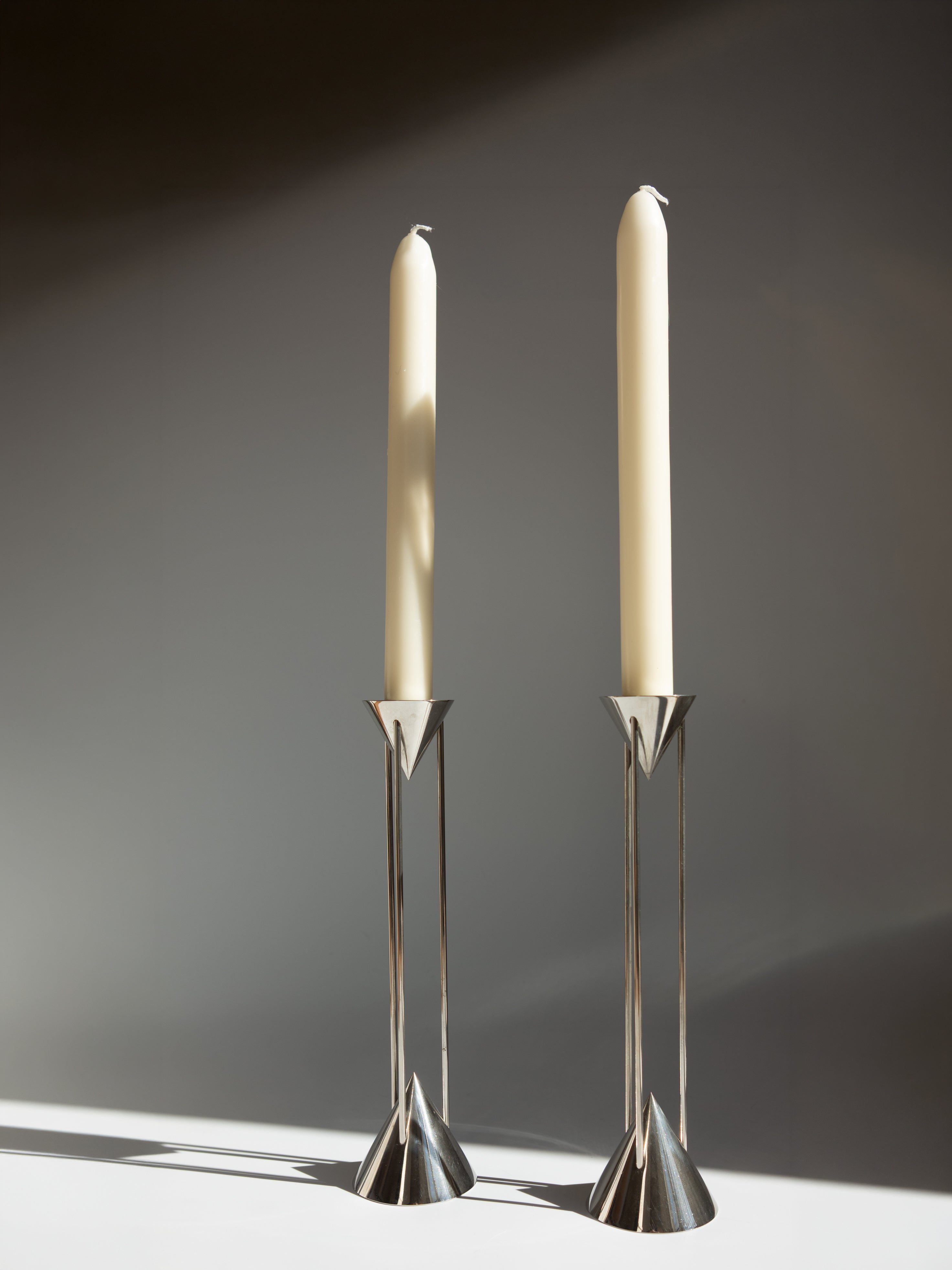 Pair of Chrome Postmodern Candlesticks by Markus Borgens for D-TEC - Germany, c. 1980s — side angle
