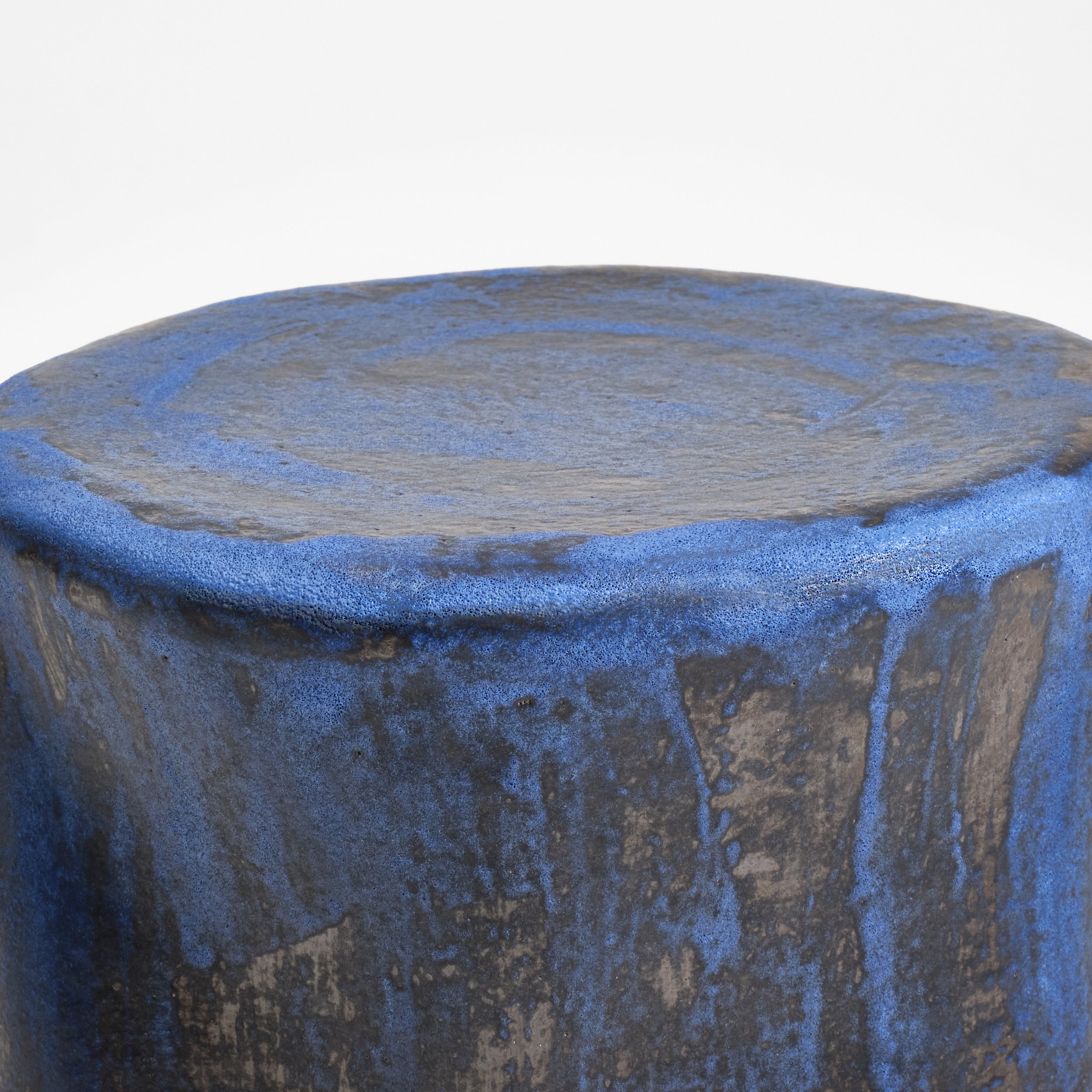Small Ceramic Side Table — top view of textured blue surface
