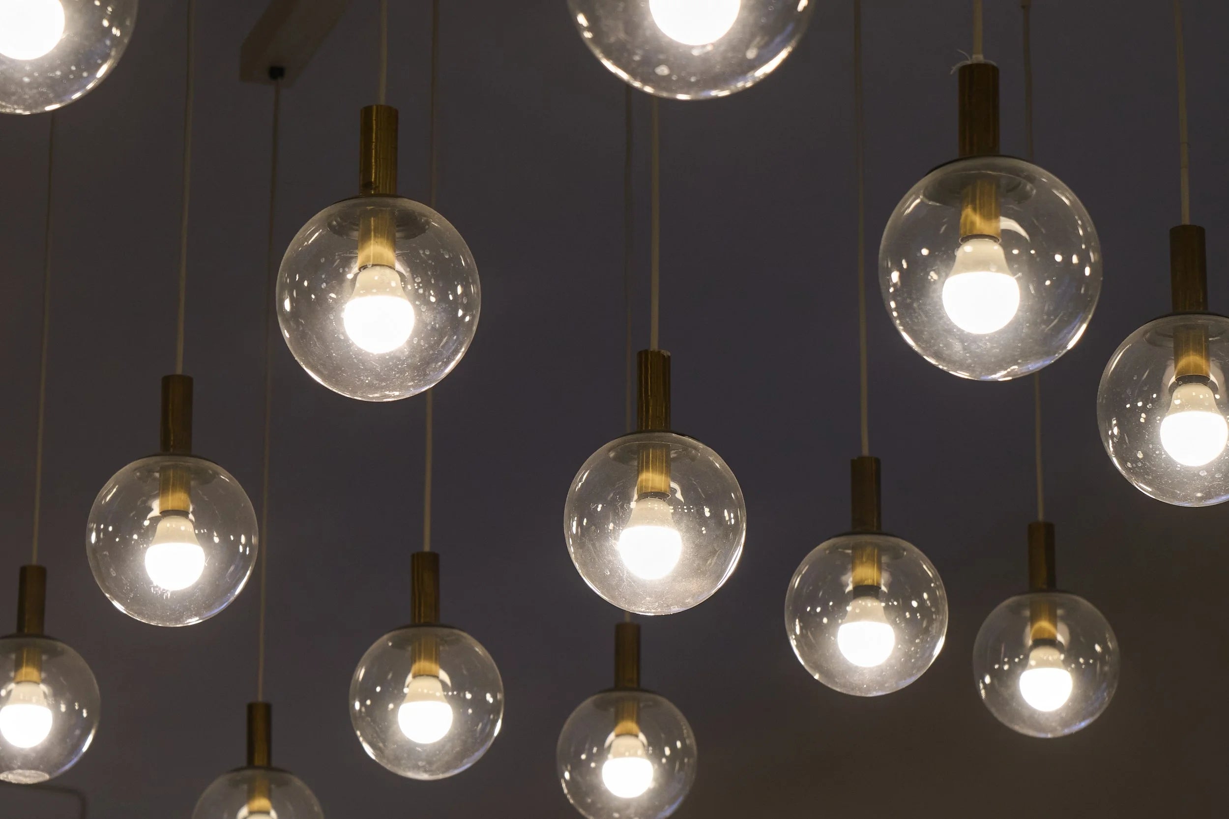 Monumental Mid-Century Chandelier in Glass, Metal and Patinated Brass 1960 — in context