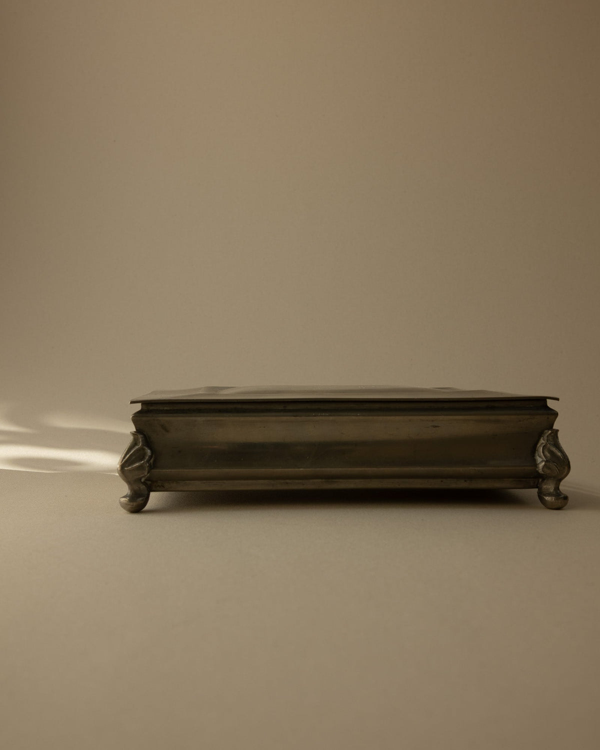 Mabos Swedish Grace Pewter Box on Sculpted Corner Feet (c. 1930s) — lifestyle setting