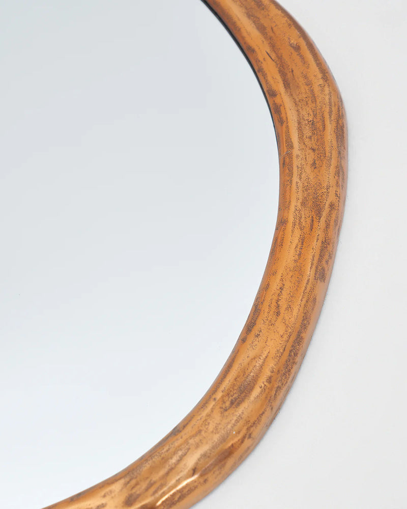 Rizzo Mirror — close-up of textured gold frame edge