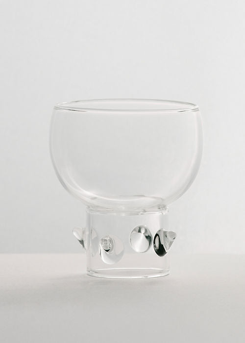Arsenico 1 x water glass — close-up of clear glass with bubble details