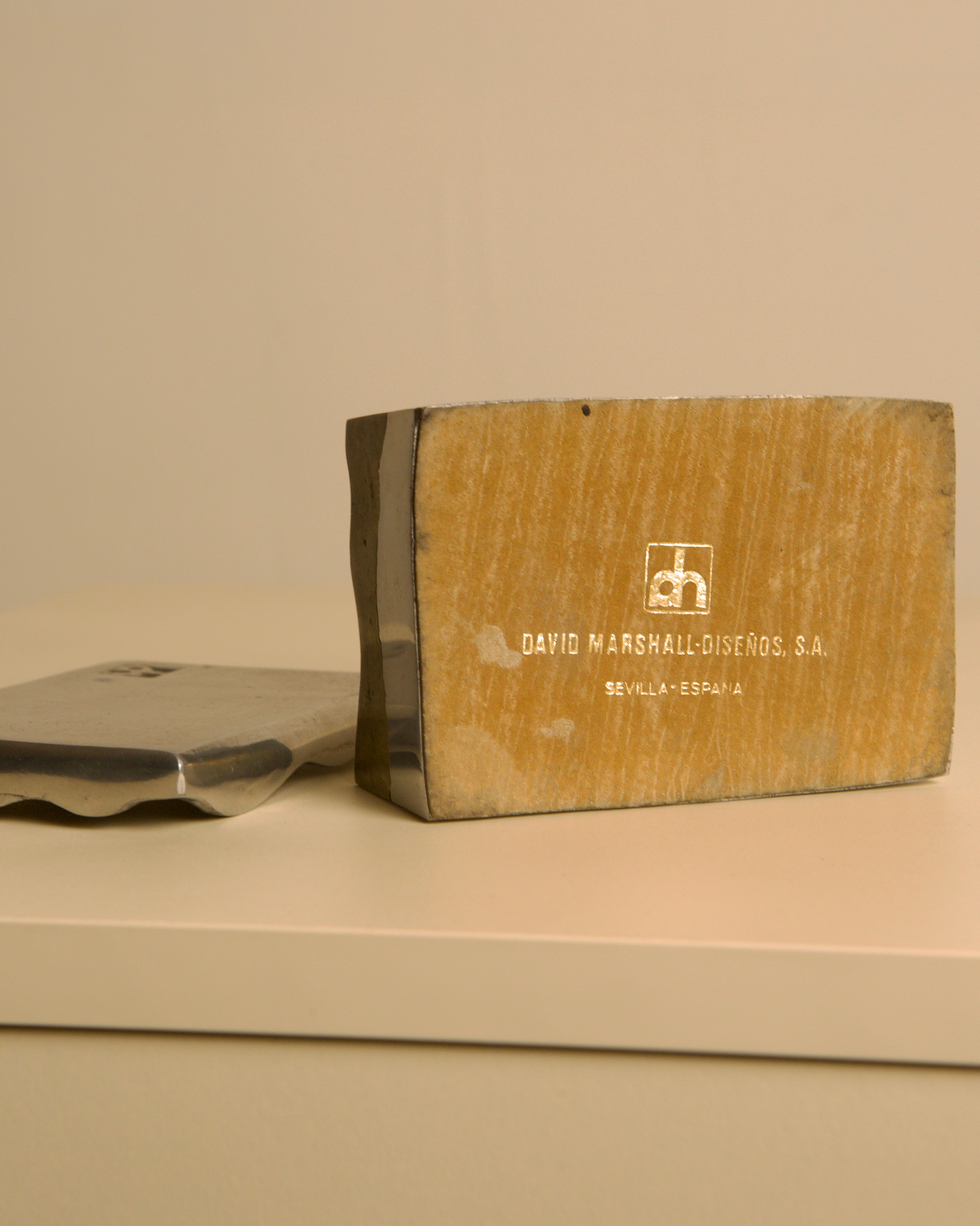 Brutalist metal and brass box by David Marshall, 1970s — top view on neutral surface