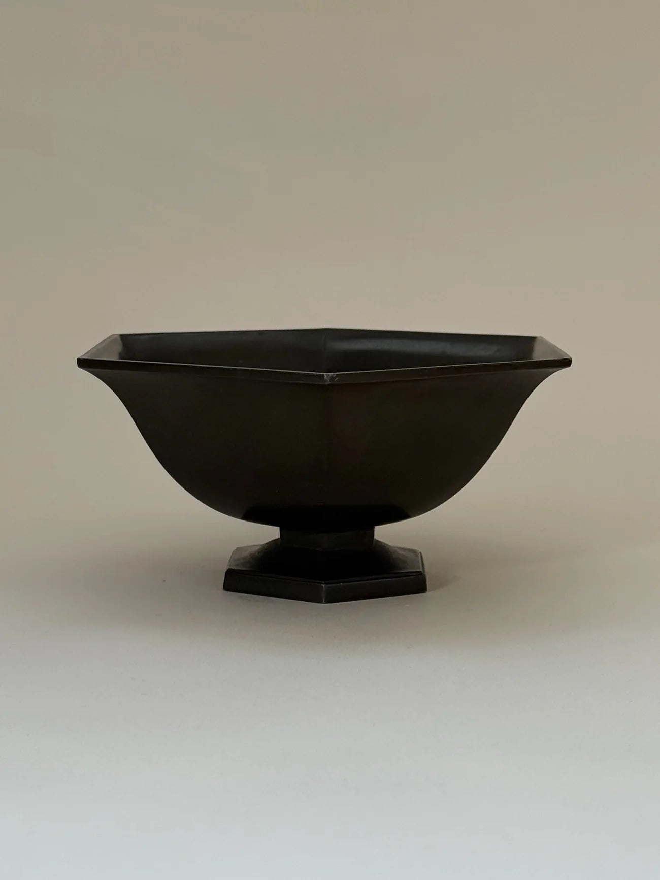 Hexagonal Just Andersen Bowl in Disko Metal — front view on neutral background