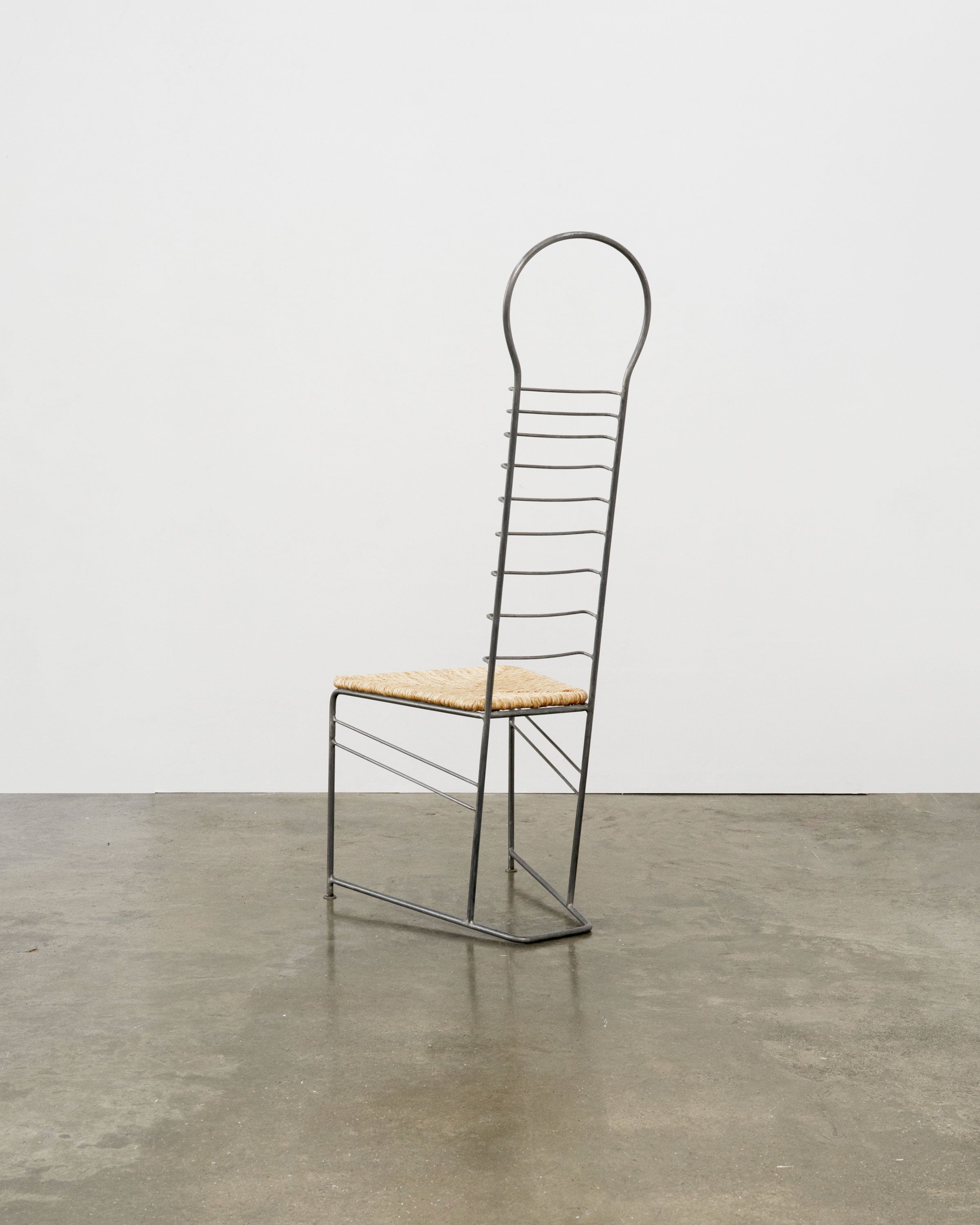 Vintage Sculptural Steel and Straw Chair