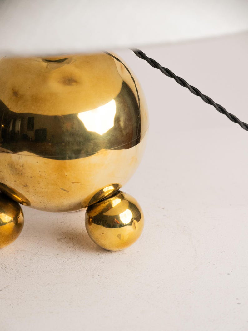 Vintage Brass Orb Lamp | Space Age Tripod Base, Mid Century Cone Shade — lifestyle setting