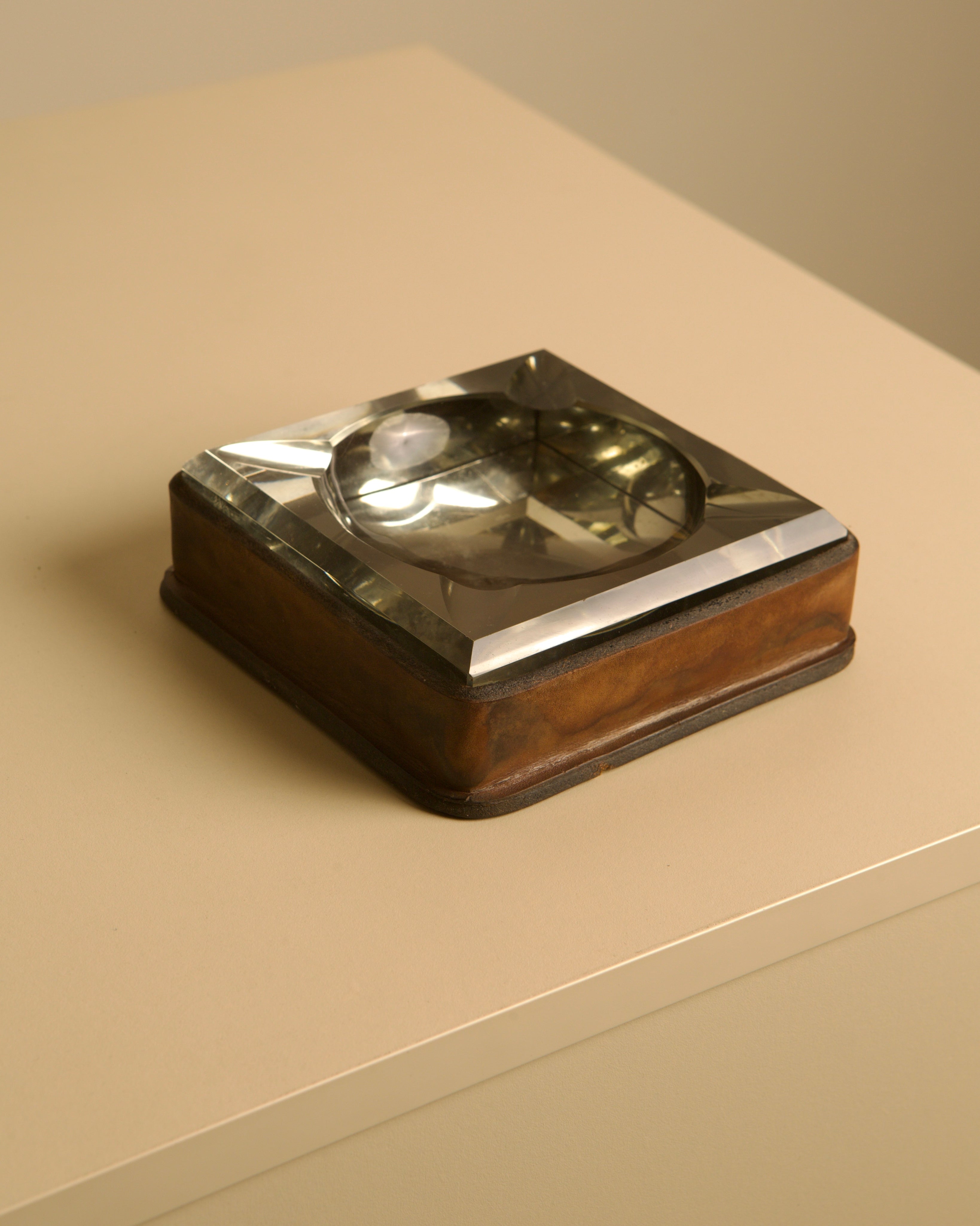 Italian Ashtray in Crystal and Leather 60's — top view showing reflective crystal and leather base