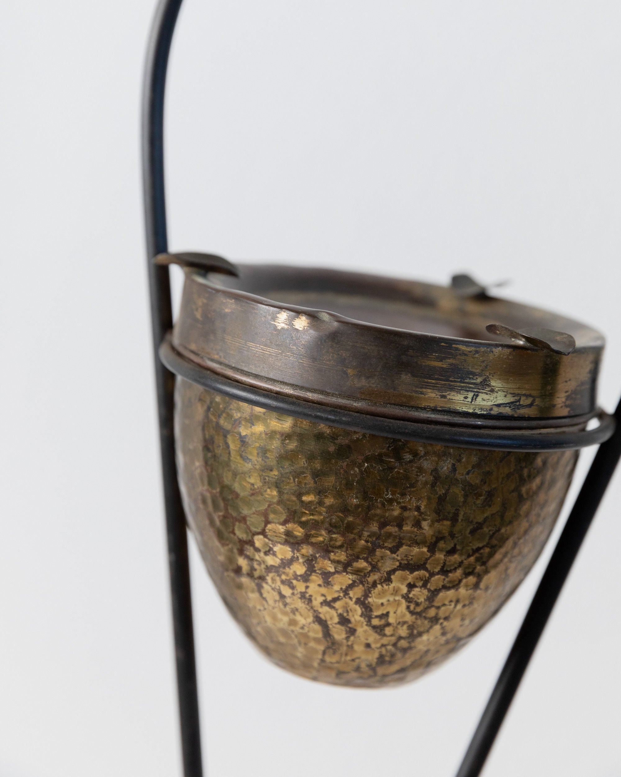 Brass Magazine Rack and Ashtray 1960s — close-up of hammered brass ashtray