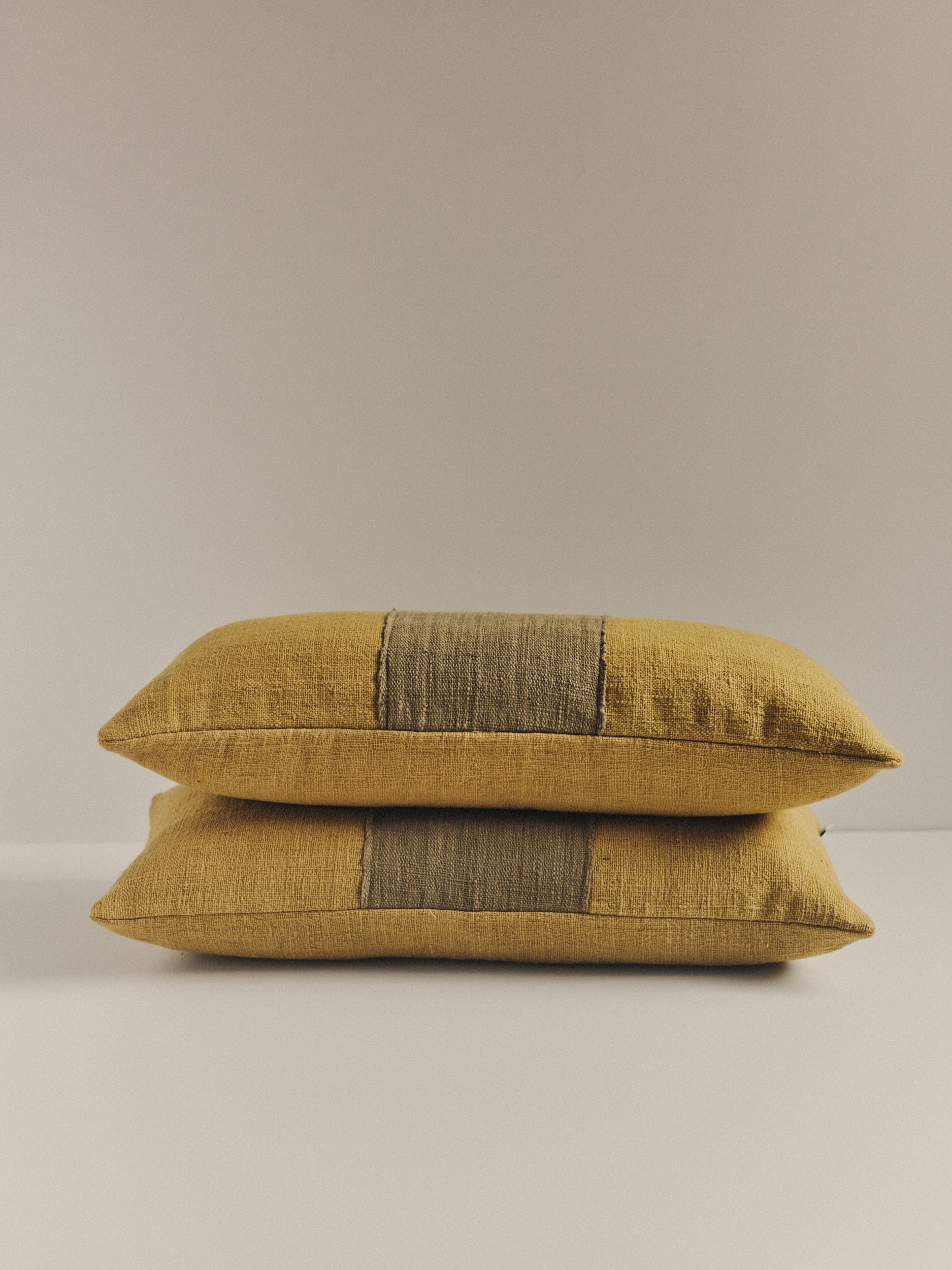 Handwoven green two-tone cushion by Elle La | The Oblist