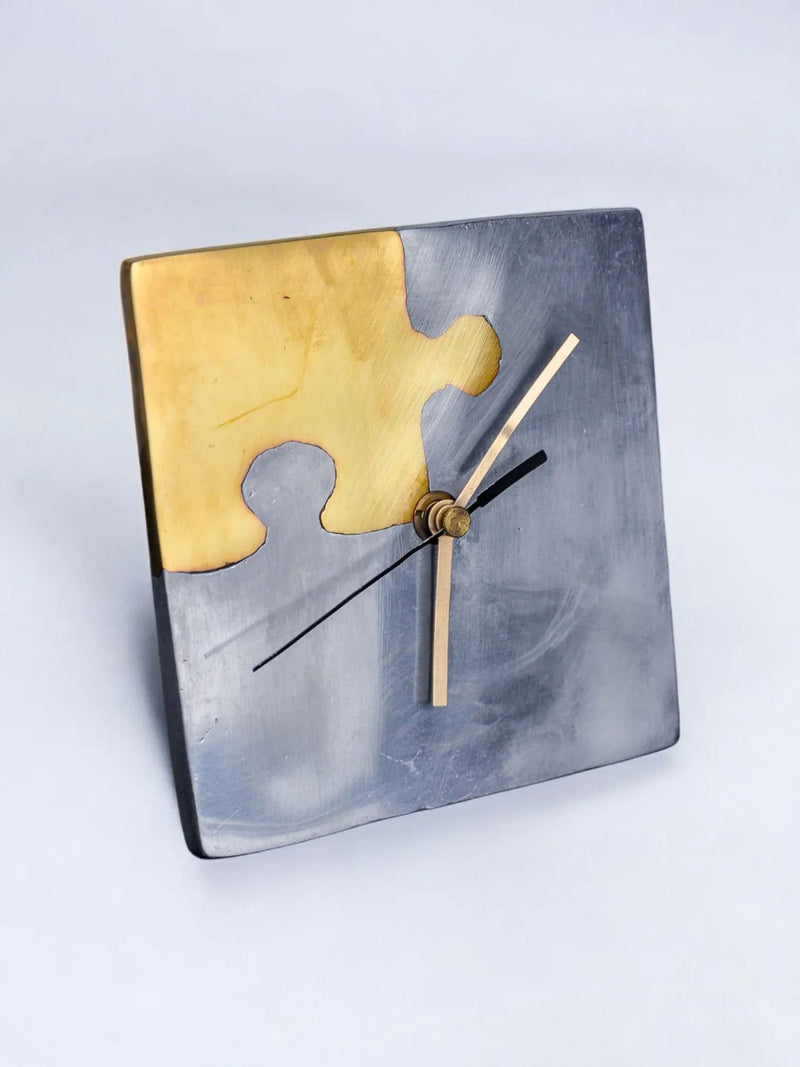 Brutalist Clock "Puzzle" by Art3, Spain, 1980 — close-up of metal and brass puzzle design