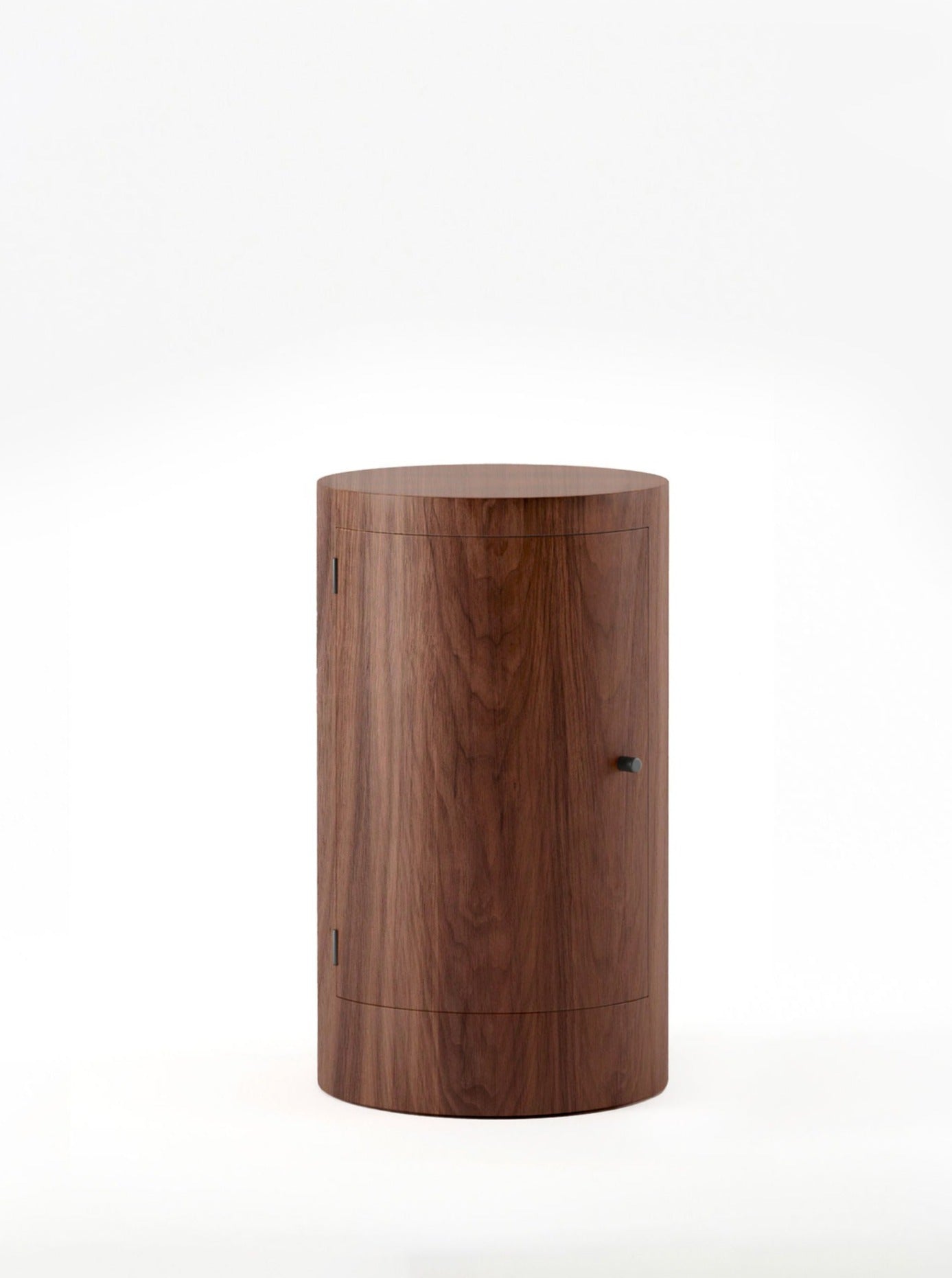Pair of Constant Nightstand in Oiled Walnut — side angle showing round shape and wood grain