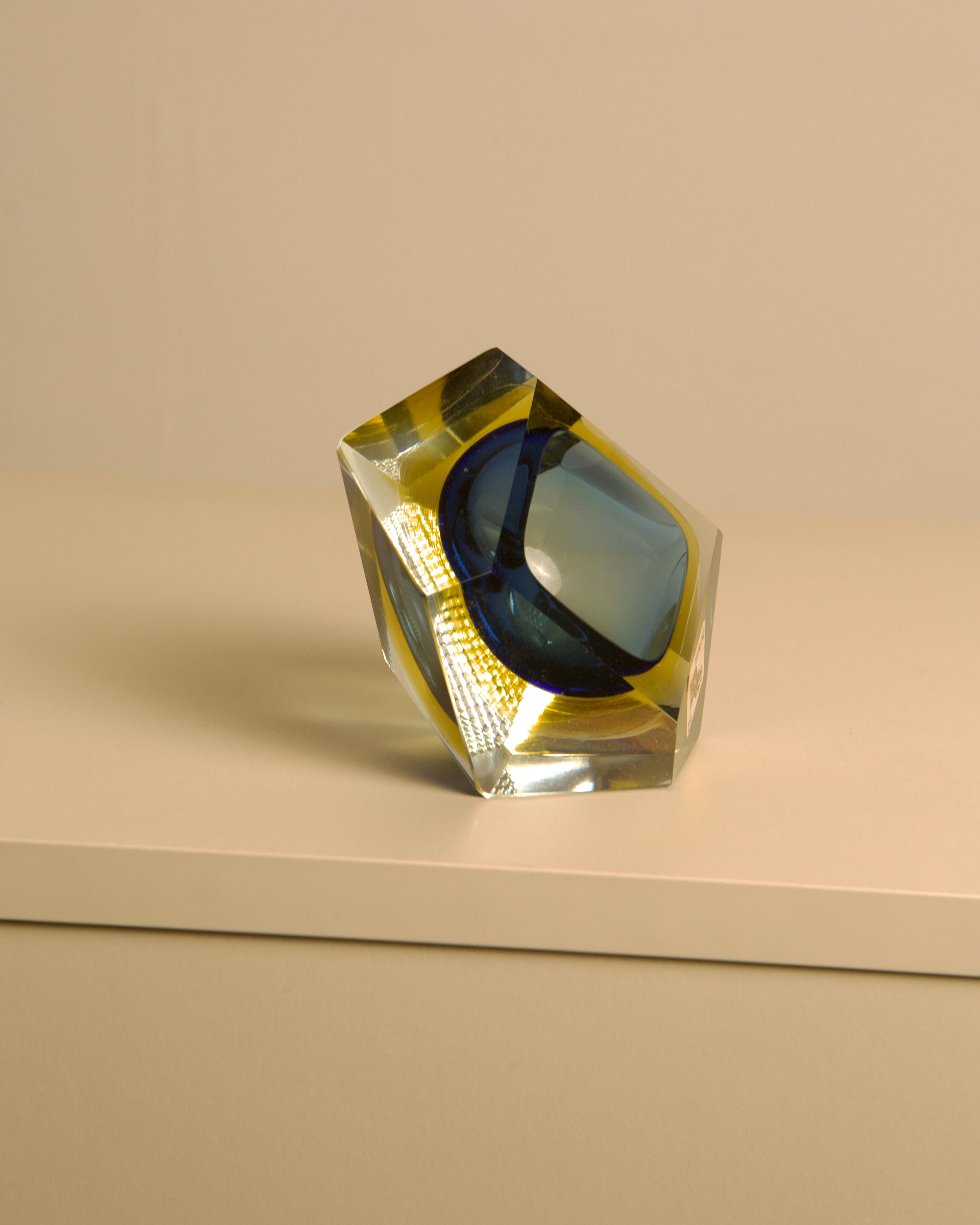 Angular view of Diamant Murano glass ashtray showing blue interior