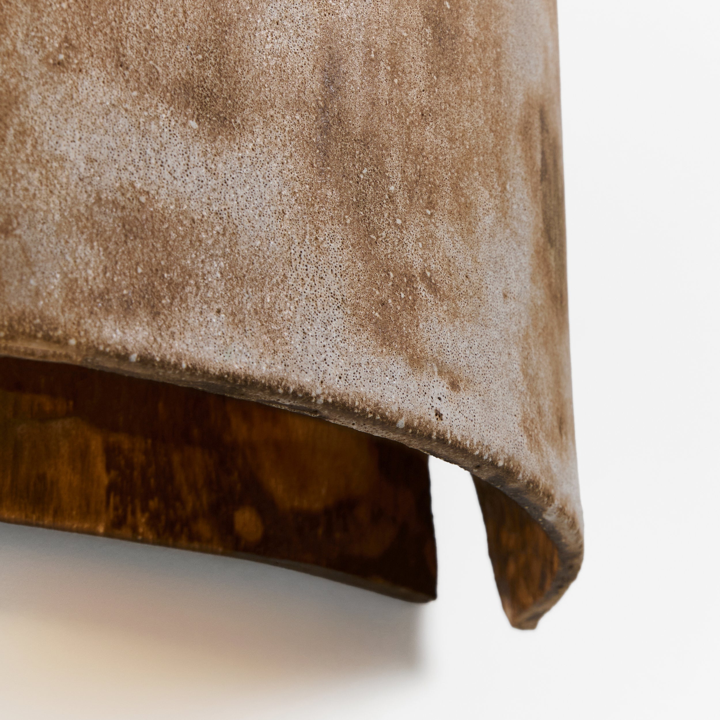 Papel Wall Light — close-up of textured brown surface