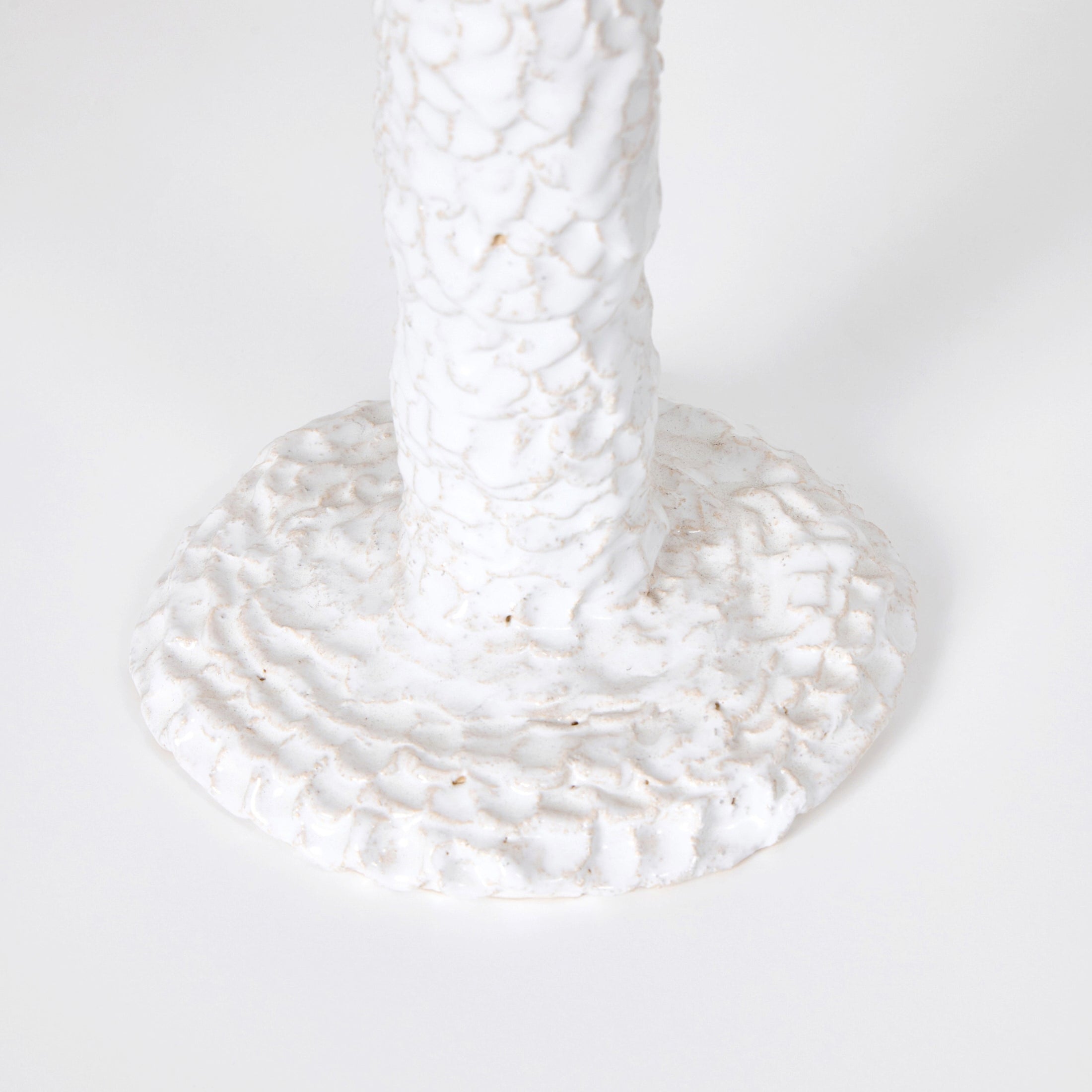 Casa Bedside Light — close-up of textured white ceramic base