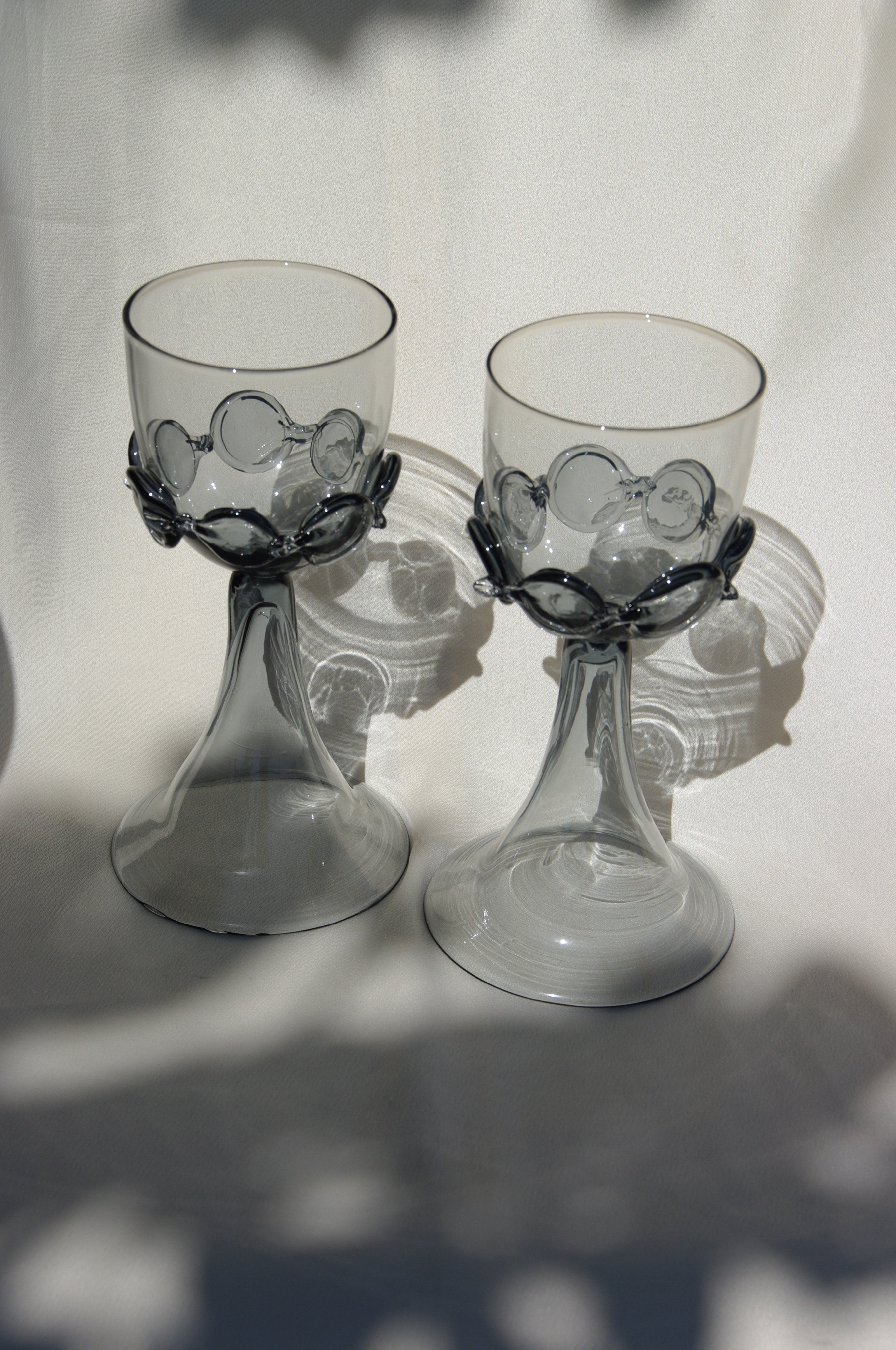 Pair of Mouthblown Wine Goblets - Chain — top view showing clear glass and metal details