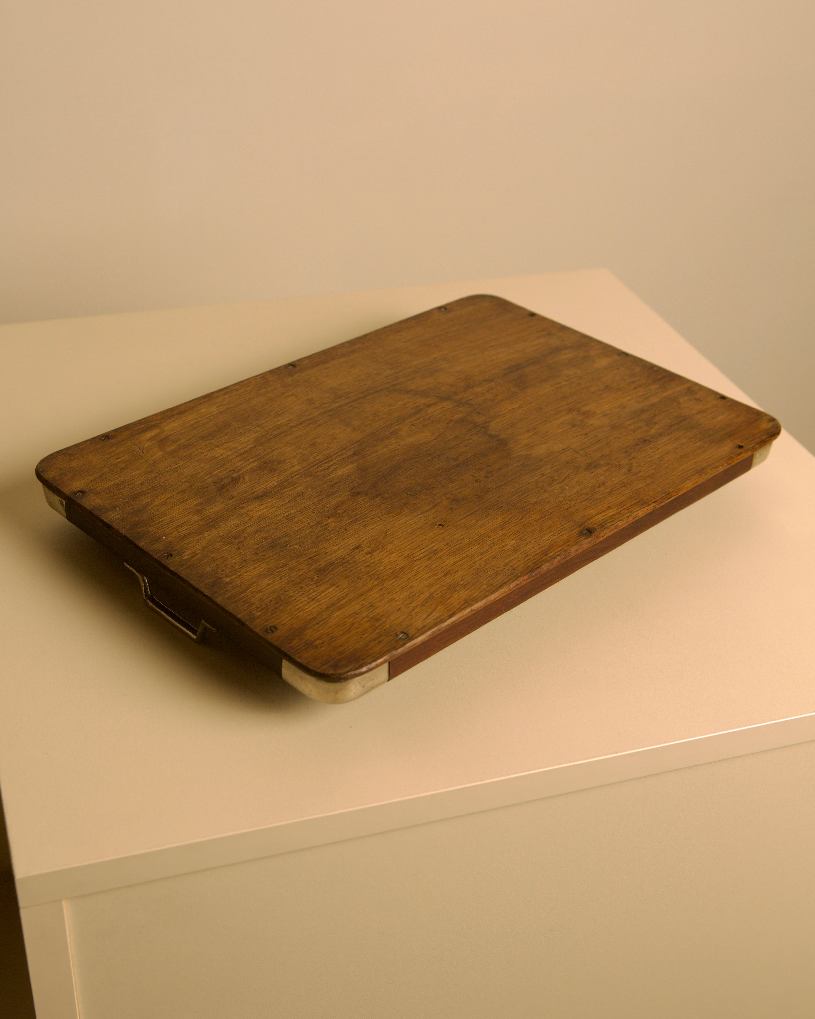 Large Italian tray in wood and metal, 1950s — top view on light surface