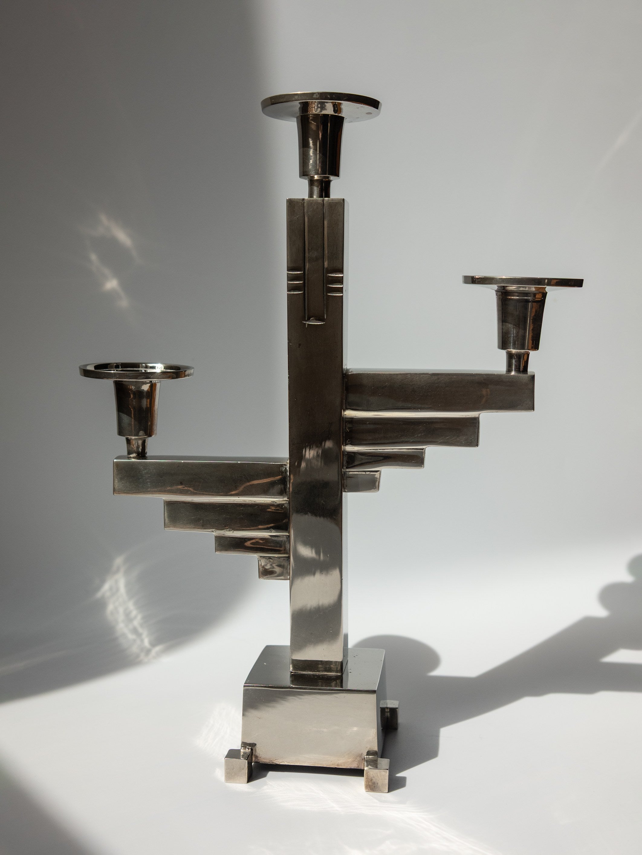 Bauhaus-Inspired Three-Arm Candelabra in Chrome-Plated Metal Germany, c. 1930 - 1950s — lifestyle setting