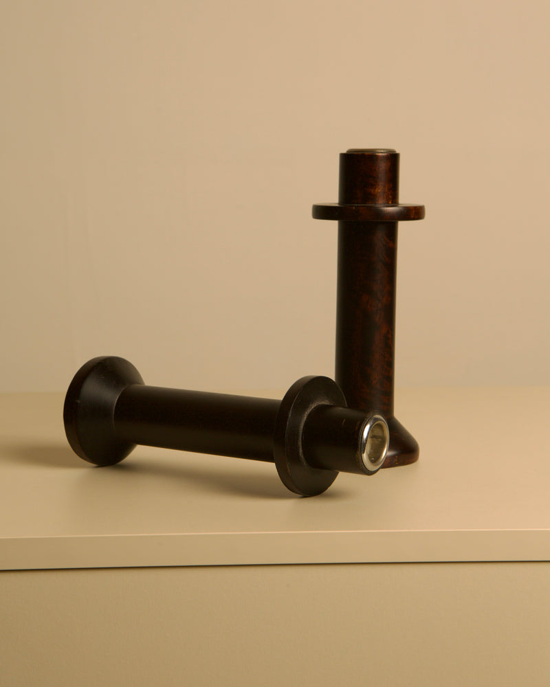 Pair of Italian Wooden Candlesticks from the 80s — close-up of dark wood finish on tabletop