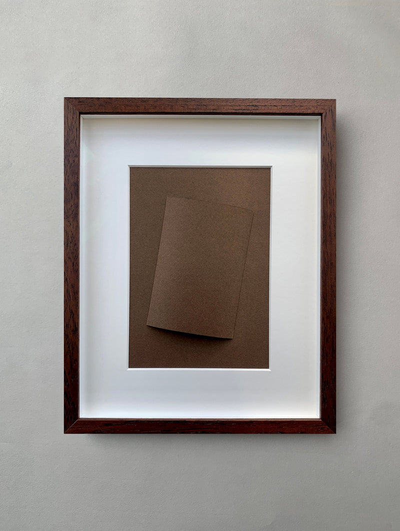 Framed brown paper fold artwork by Marie Pomme Adriaansen