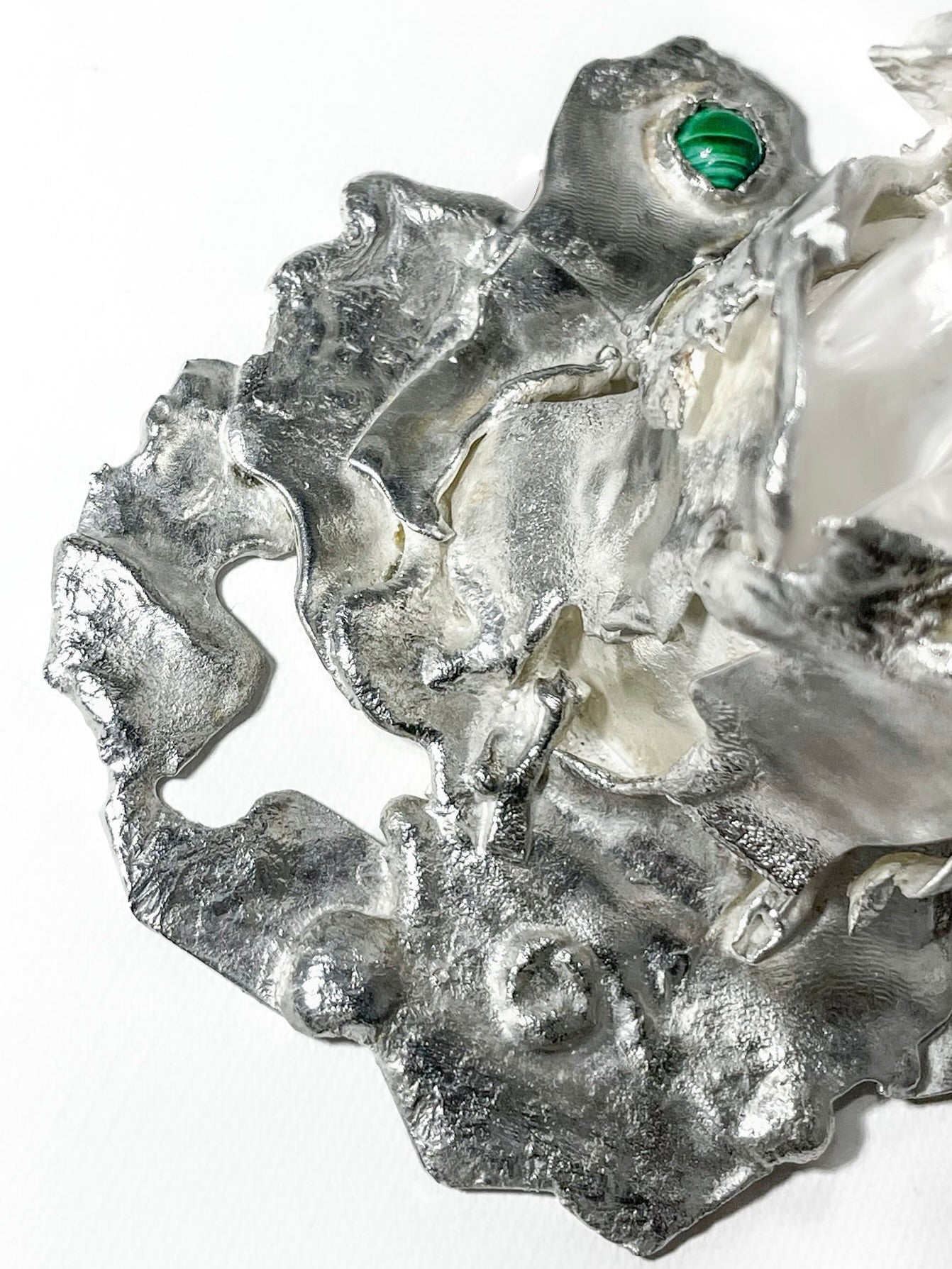 Jewelled Goblet no. 3 x Lindsey Fontijn — close-up of silver texture with green detail