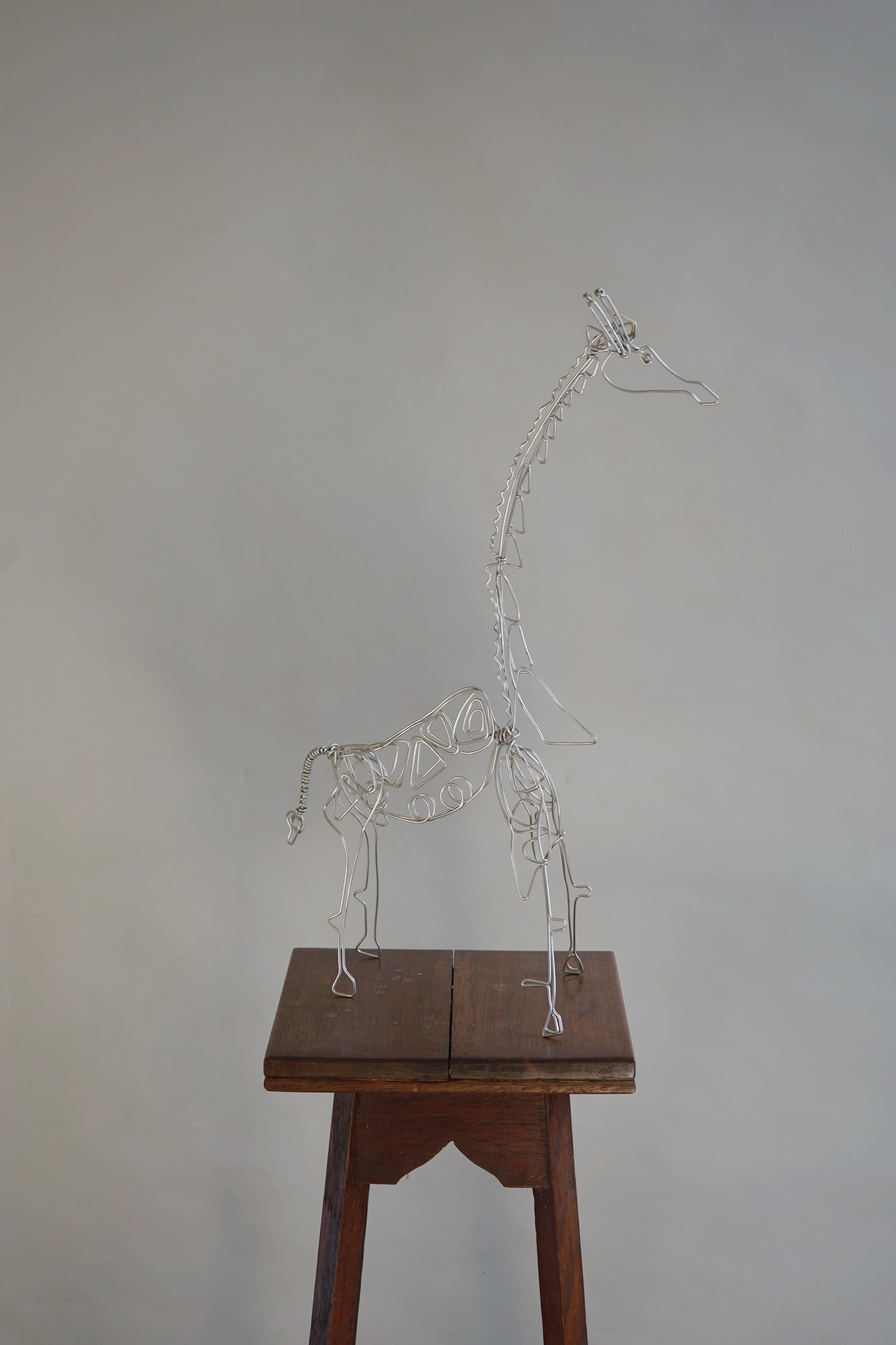 Wirework Giraffe Sculpture — close-up of handcrafted silver wire details