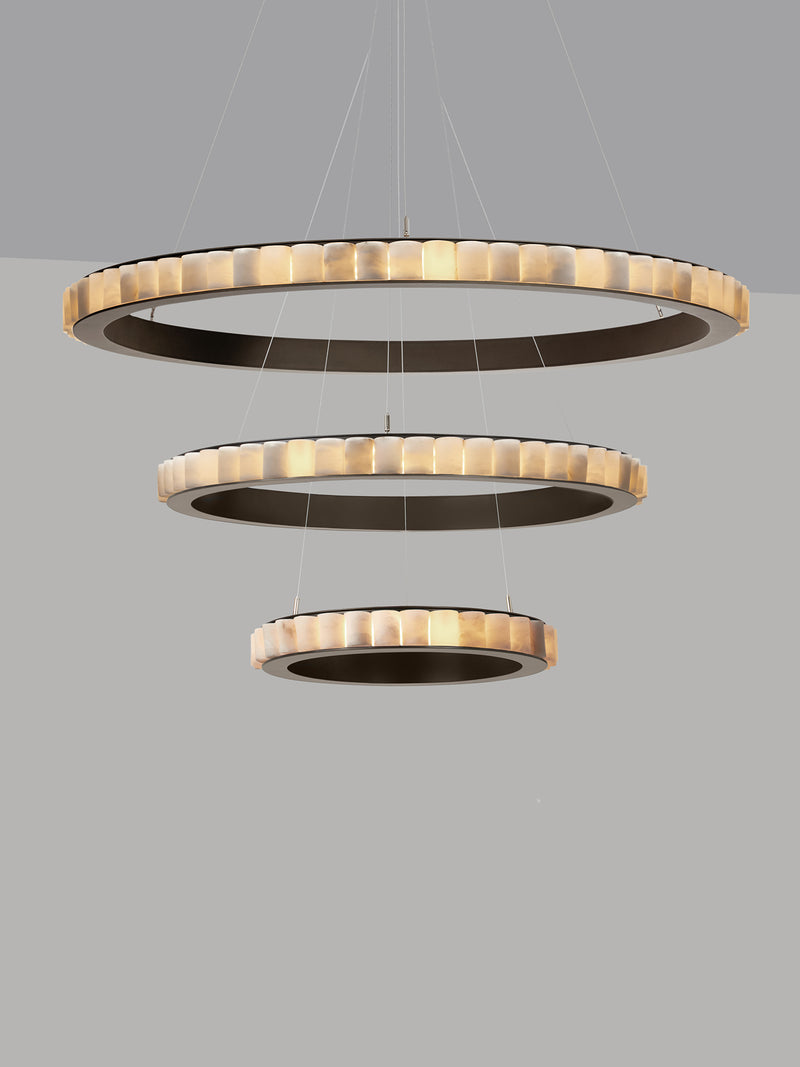 AVALON Triple Chandelier With Ceiling Rose — close-up of circular pendant rings in warm tones
