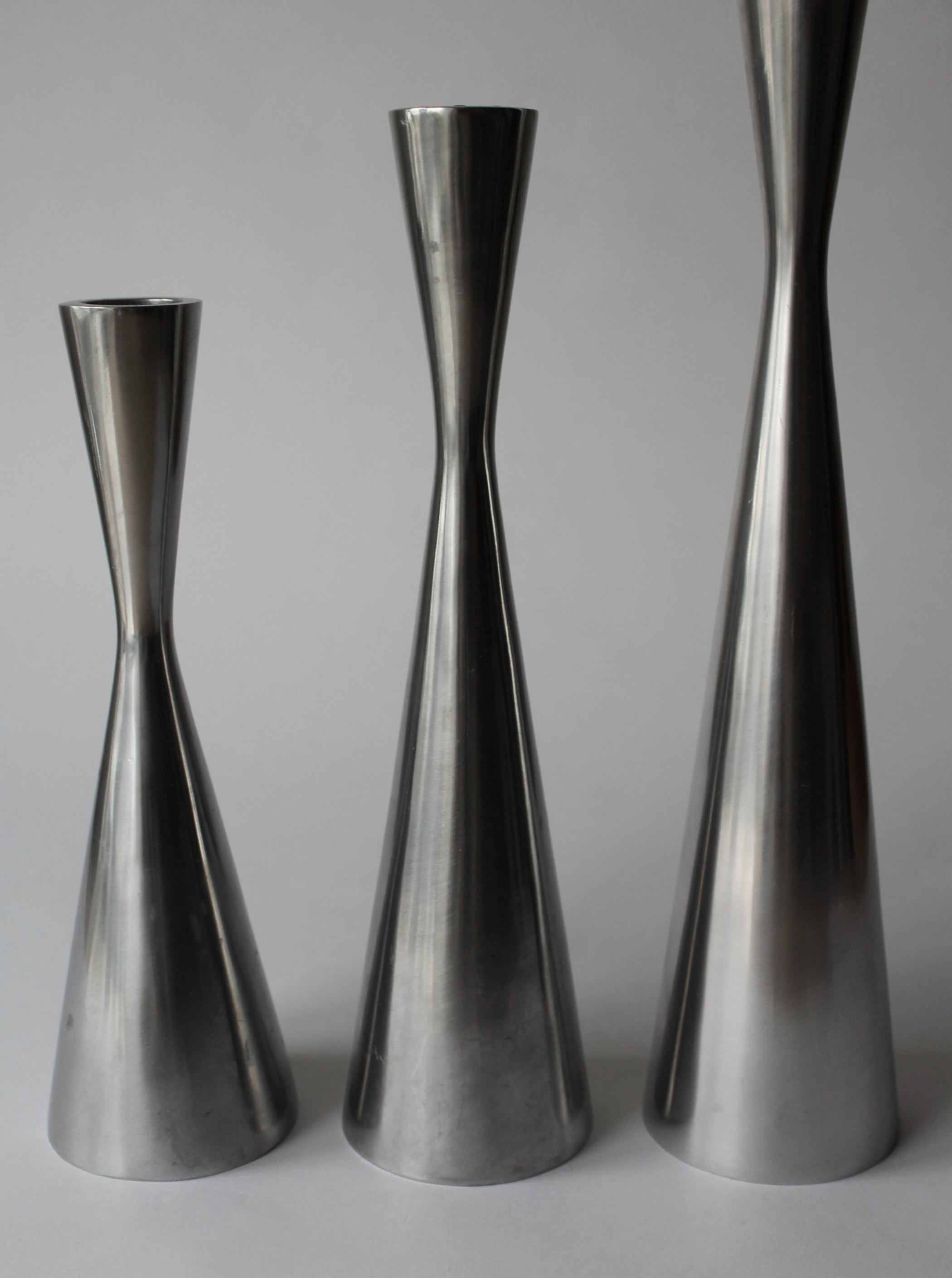 Polished Aluminum Trio Set Of Candle Holders
