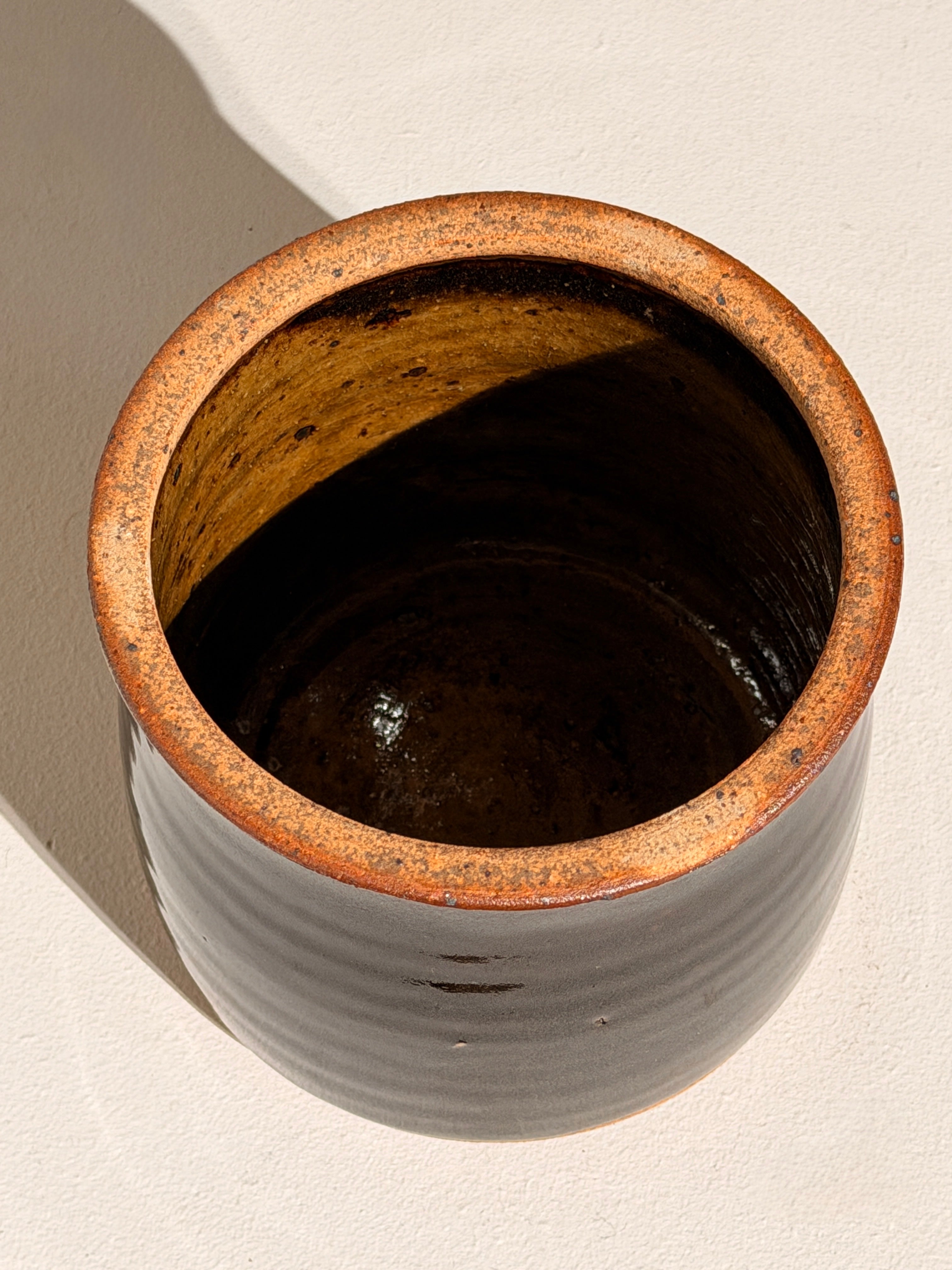 Lidded Stoneware Pot, France, circa 1960–1970 — top view showing dark glaze interior