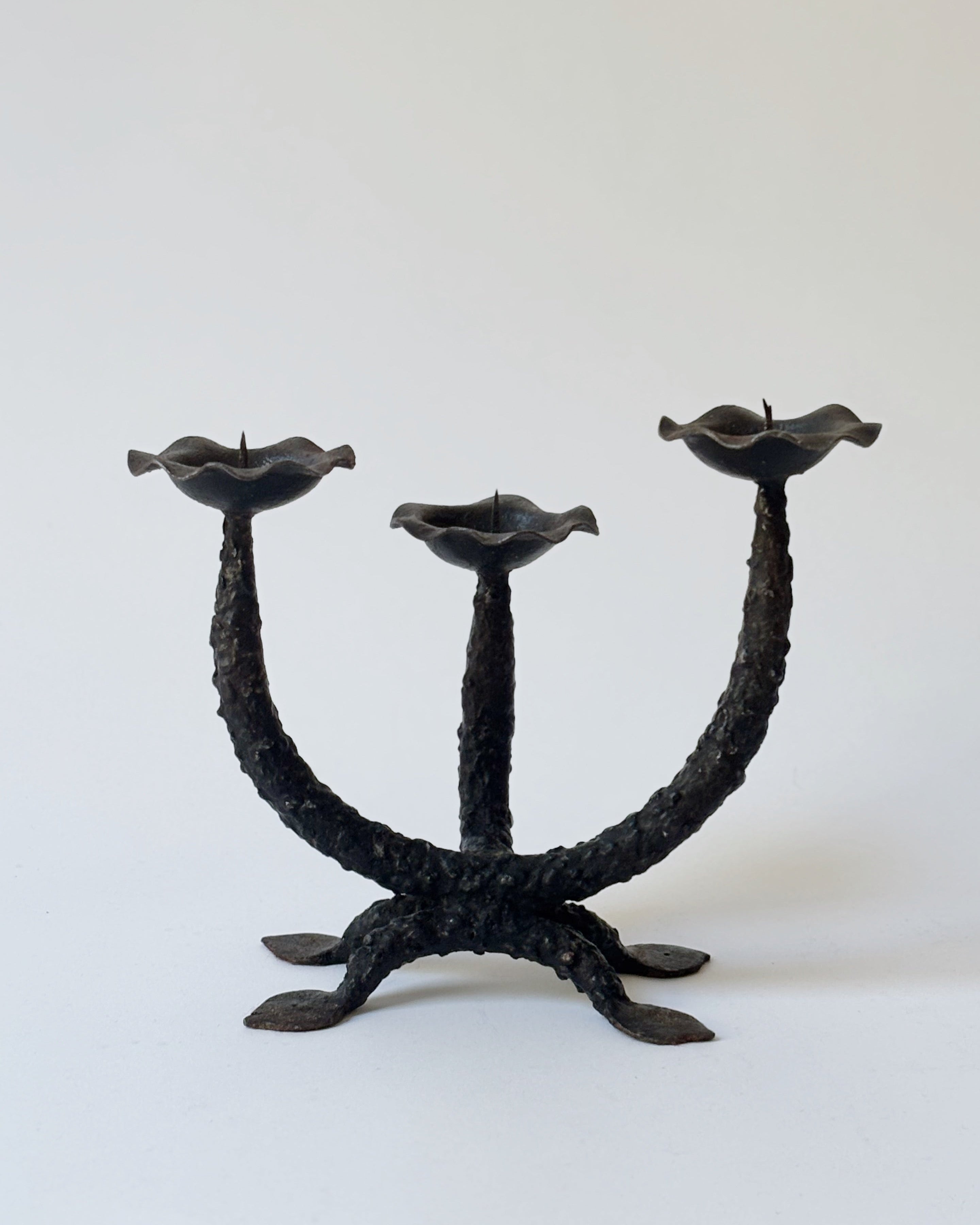 Metal Textured Artisan Candlestick, Poland — close-up of black metal texture