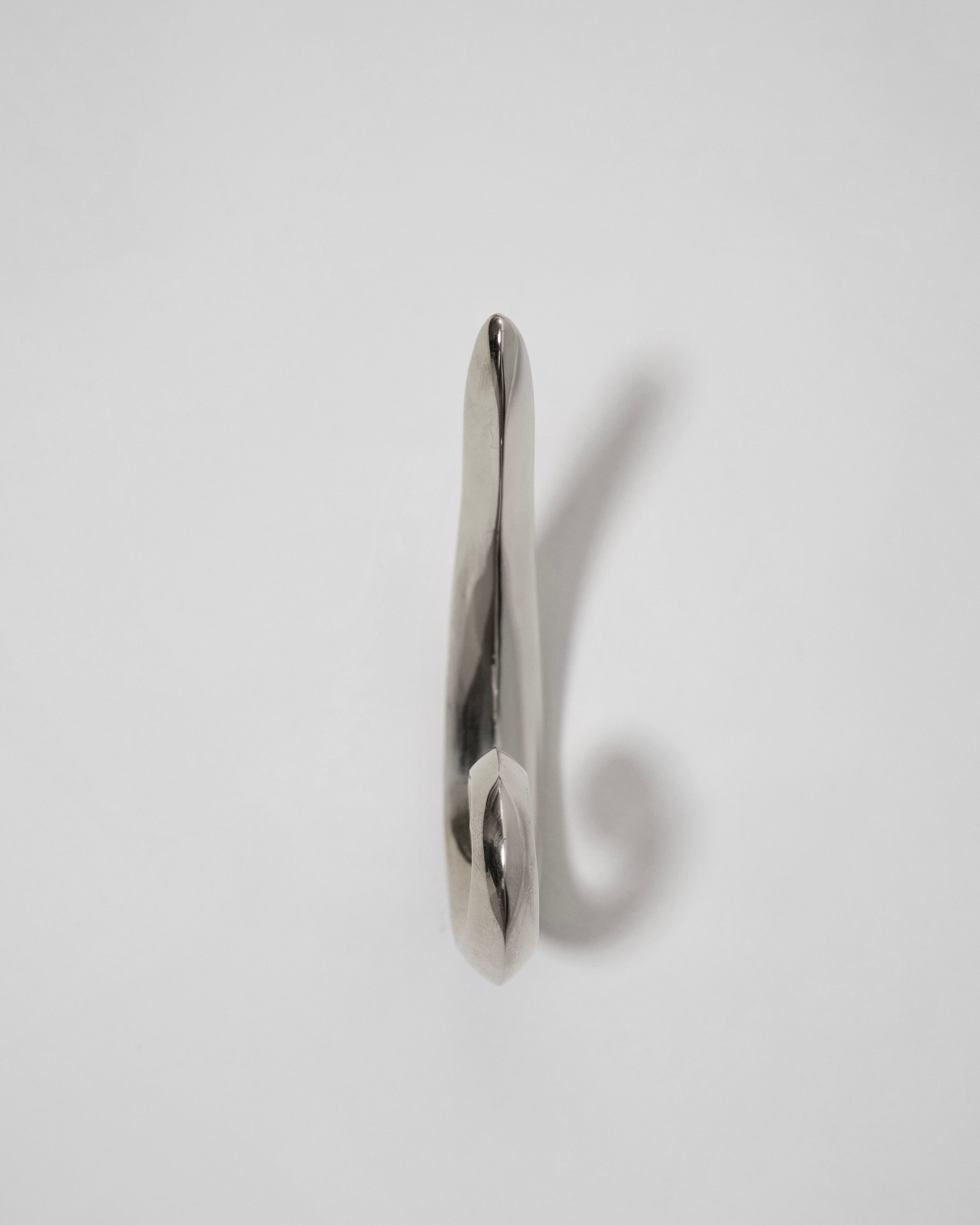 Noelle Hook - Titanium — top view highlighting smooth metallic finish