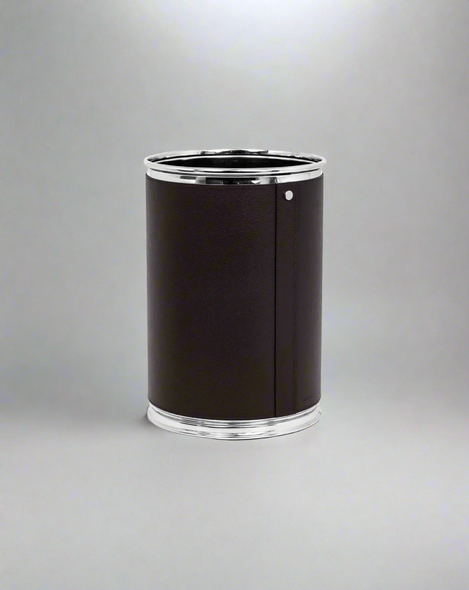 A cylindrical black Pinetti genuine calf leather trash bin on a white background.