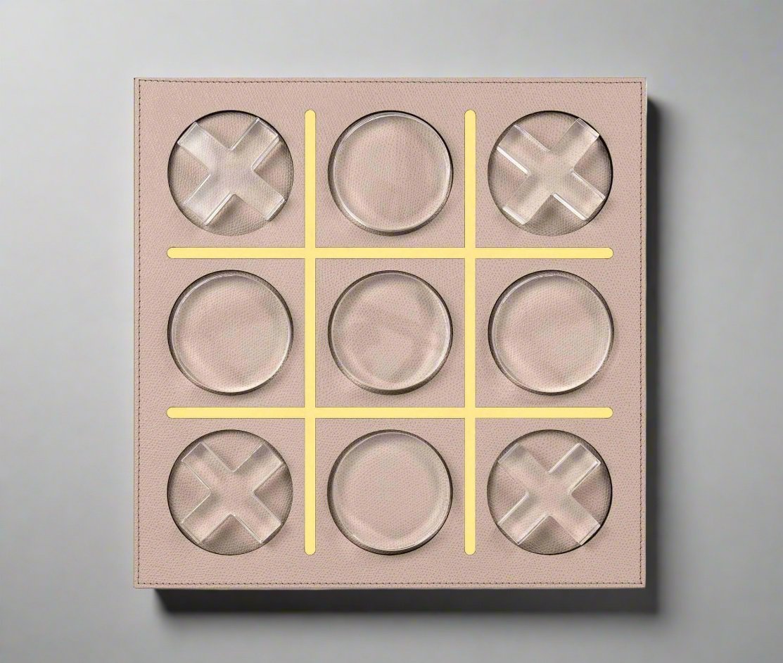 An image of a Boston Tris - Tic Tac Toe game with metallic x's and plexiglass noughts on a beige board. The game is in progress with a central grid outlined in yellow. The product is from Pinetti.