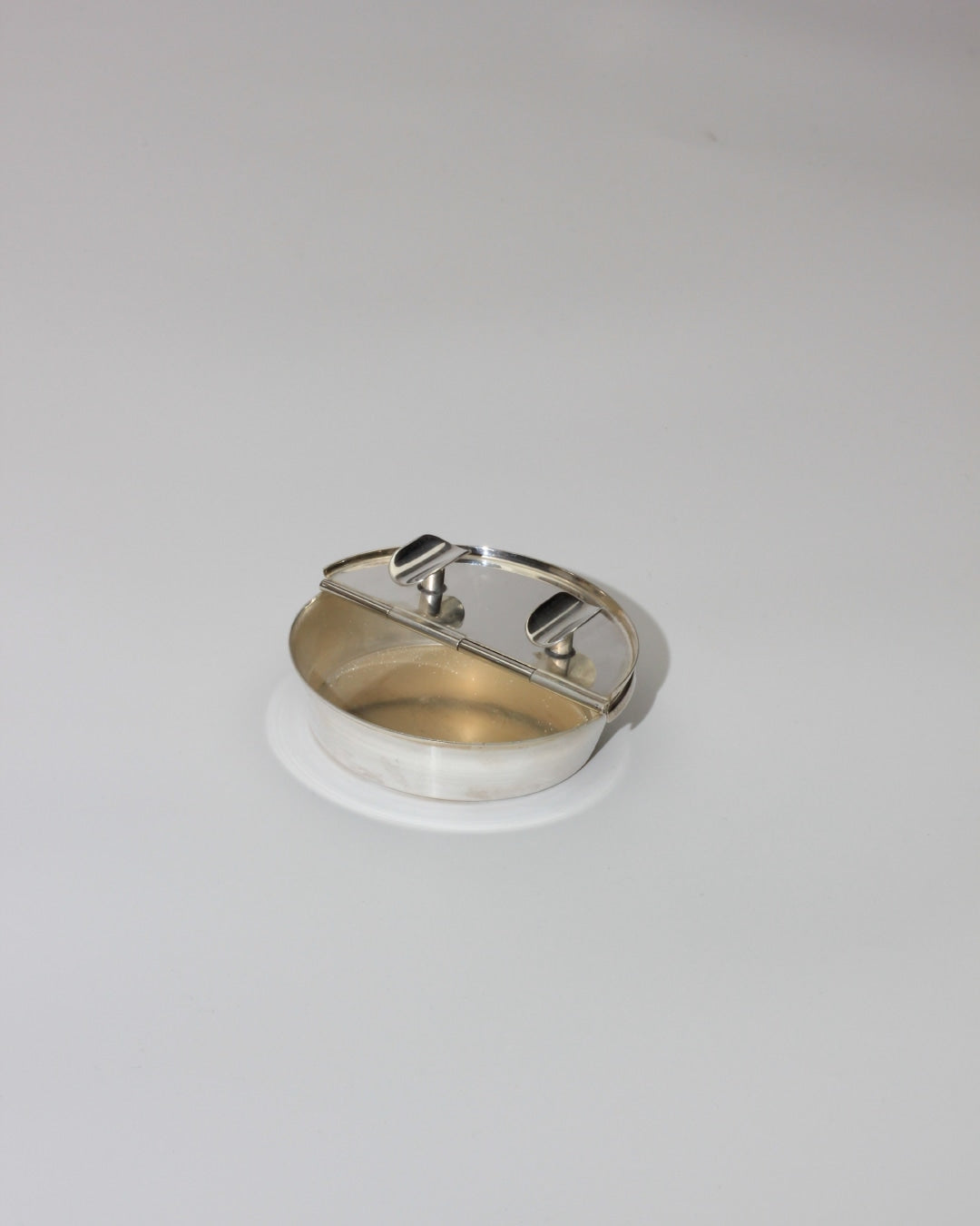 Vintage Ashtray - Alpaca Collection — side angle showing silver and white materials