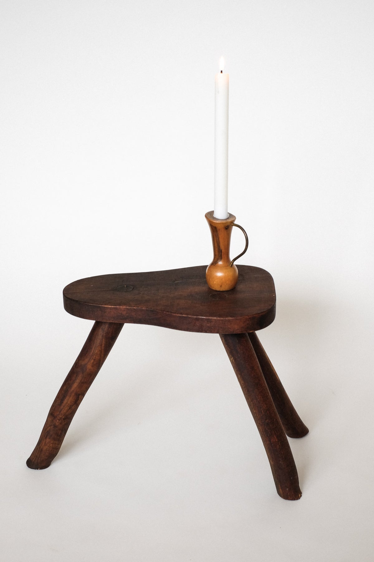 Rustic Vintage Three-Legged Wooden Stool — lifestyle setting