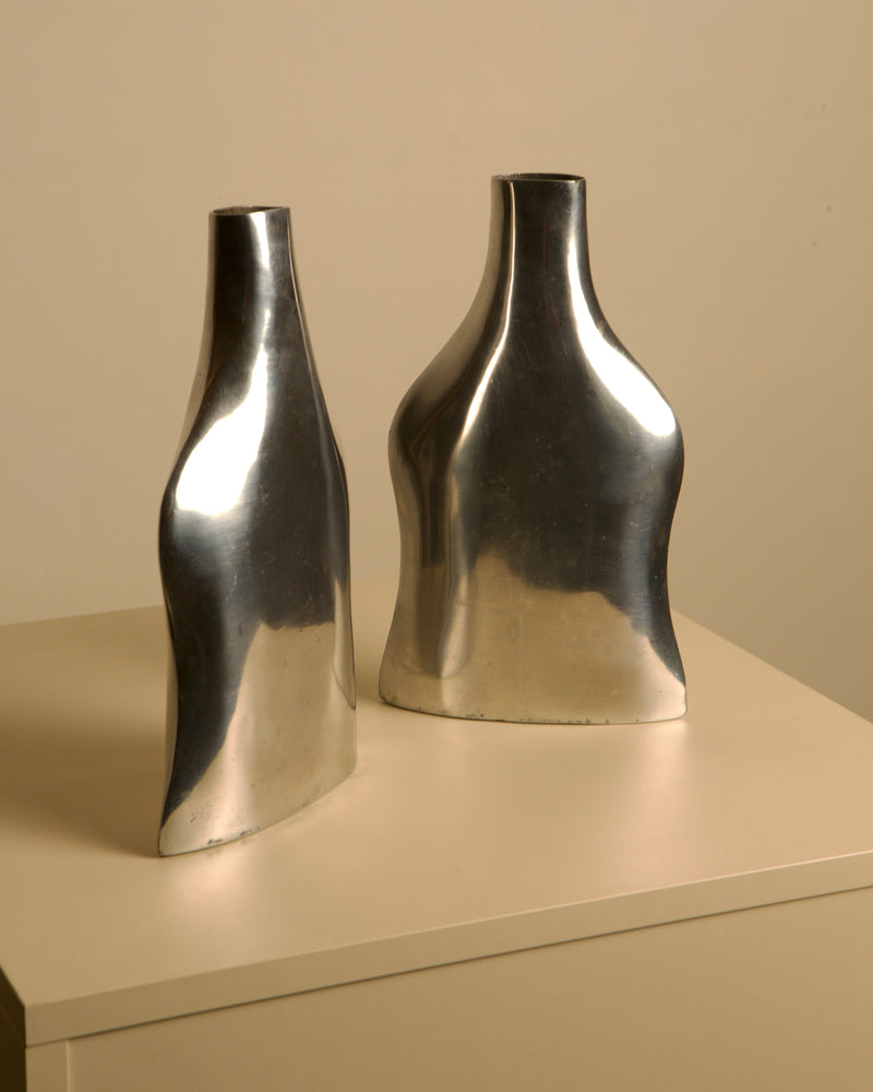 Pair of Italian Cast Aluminum Vases 1980s — close-up of reflective aluminum surface