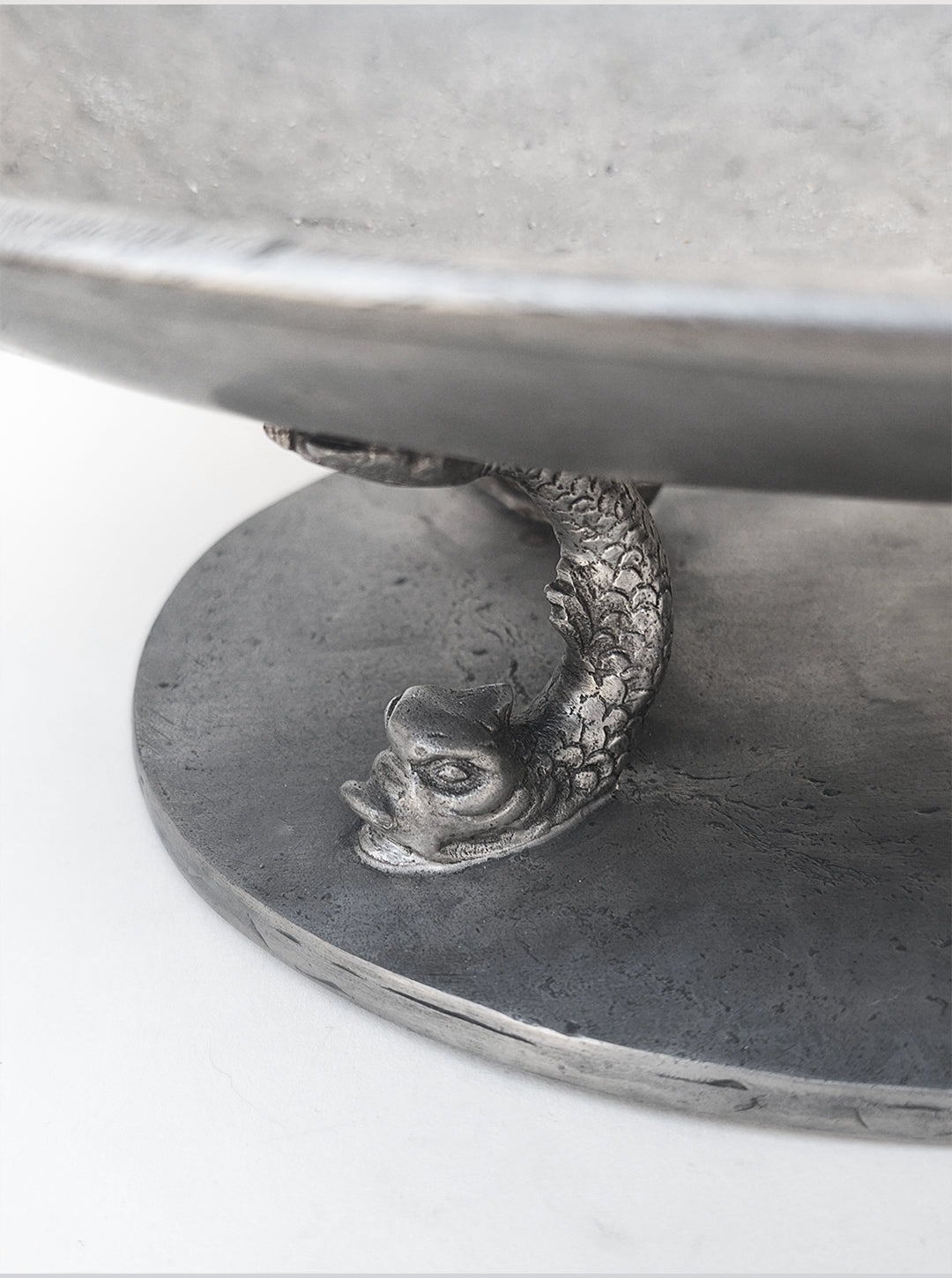 Large Pewter Fruit Cup — side angle showing fish-shaped base detail