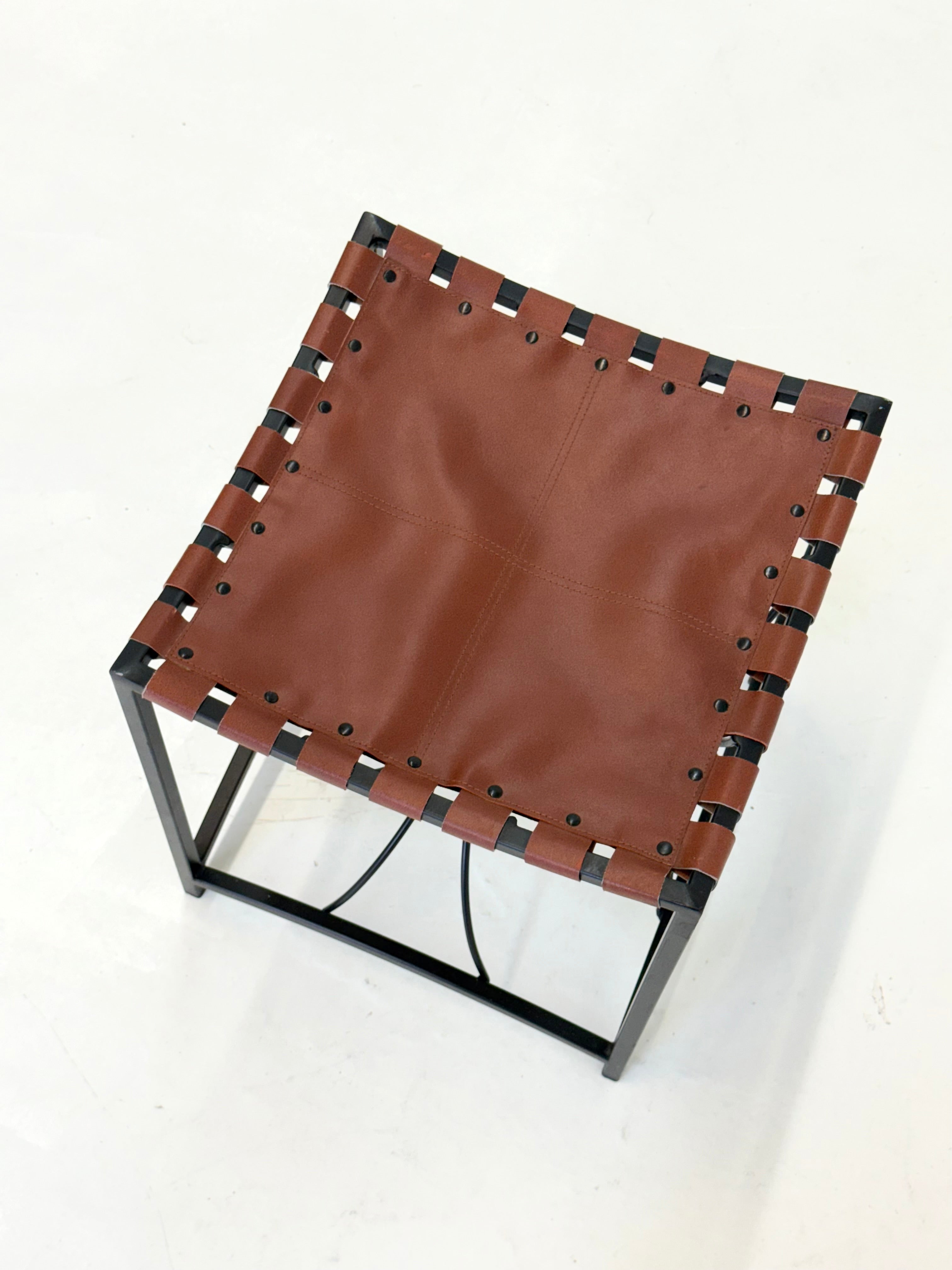 Elegant vintage French stool with black metal and brown leather — additional view