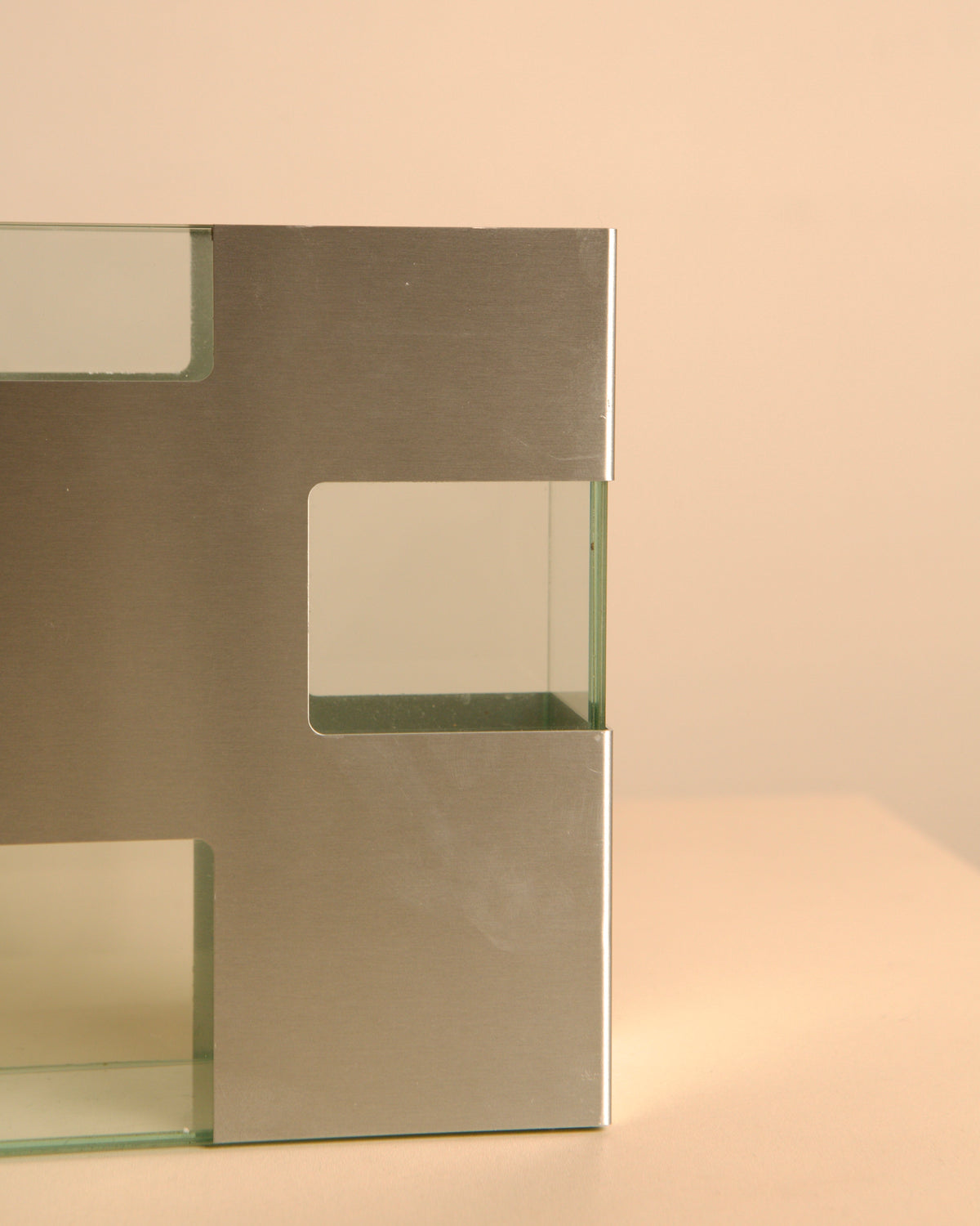 Italian brushed metal and glass vase, 1980s — lifestyle setting
