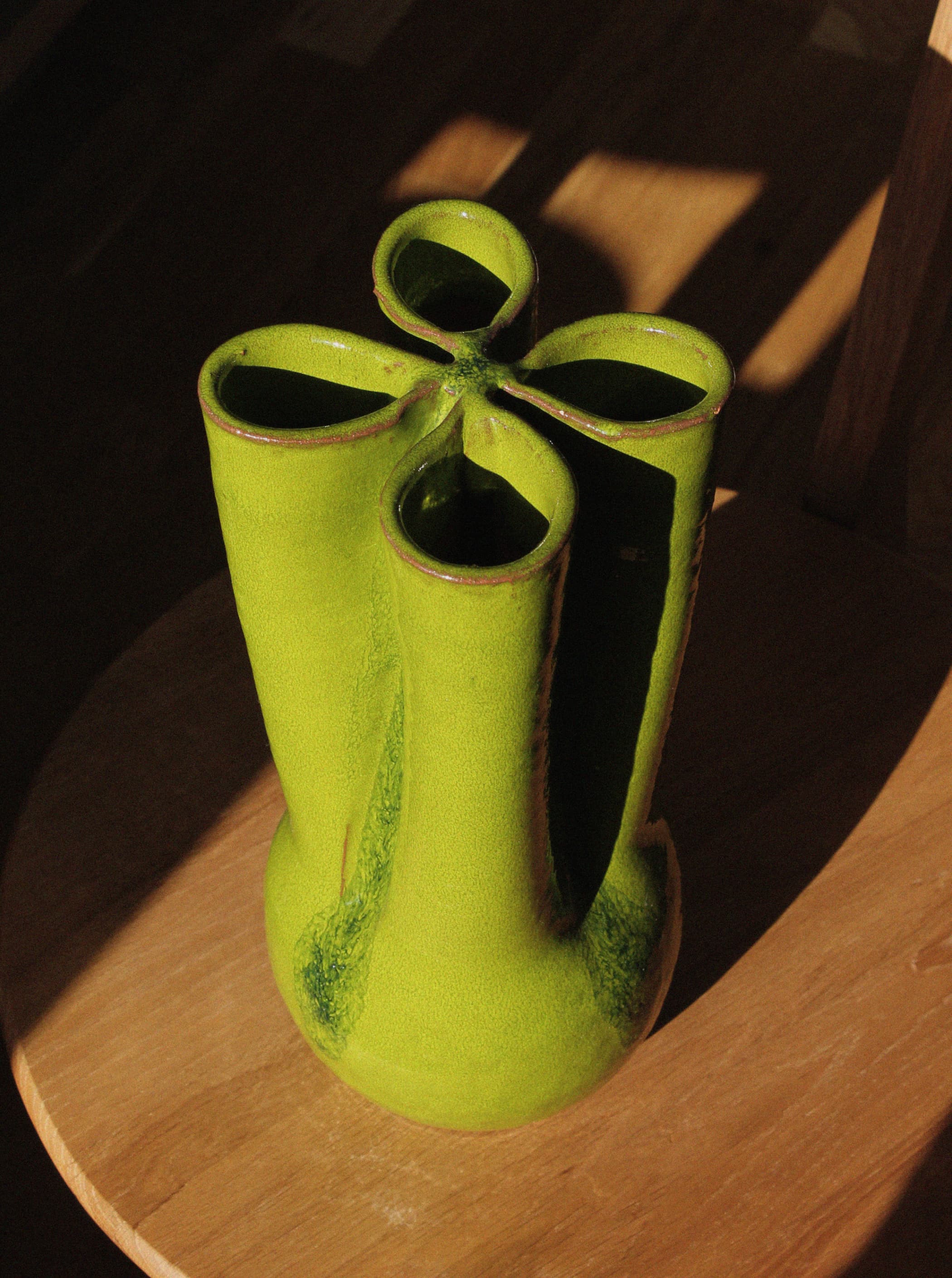 Unique tubular opening detail of green ceramic 70s vase