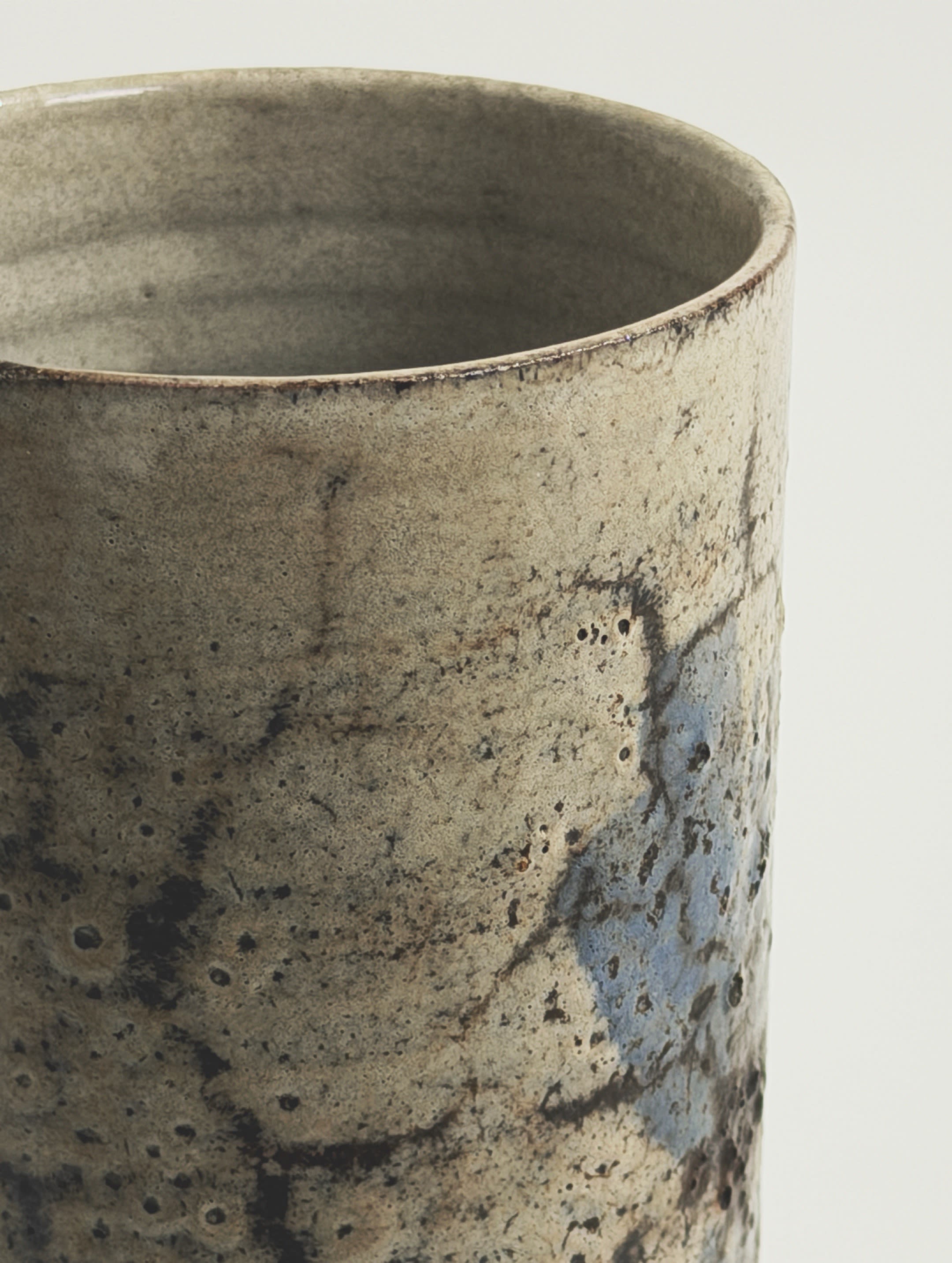 Roller vase by Gustave Reynaud, Atelier Le Mûrier, Vallauris, circa 1960 — close-up of textured ceramic surface with earthy t
