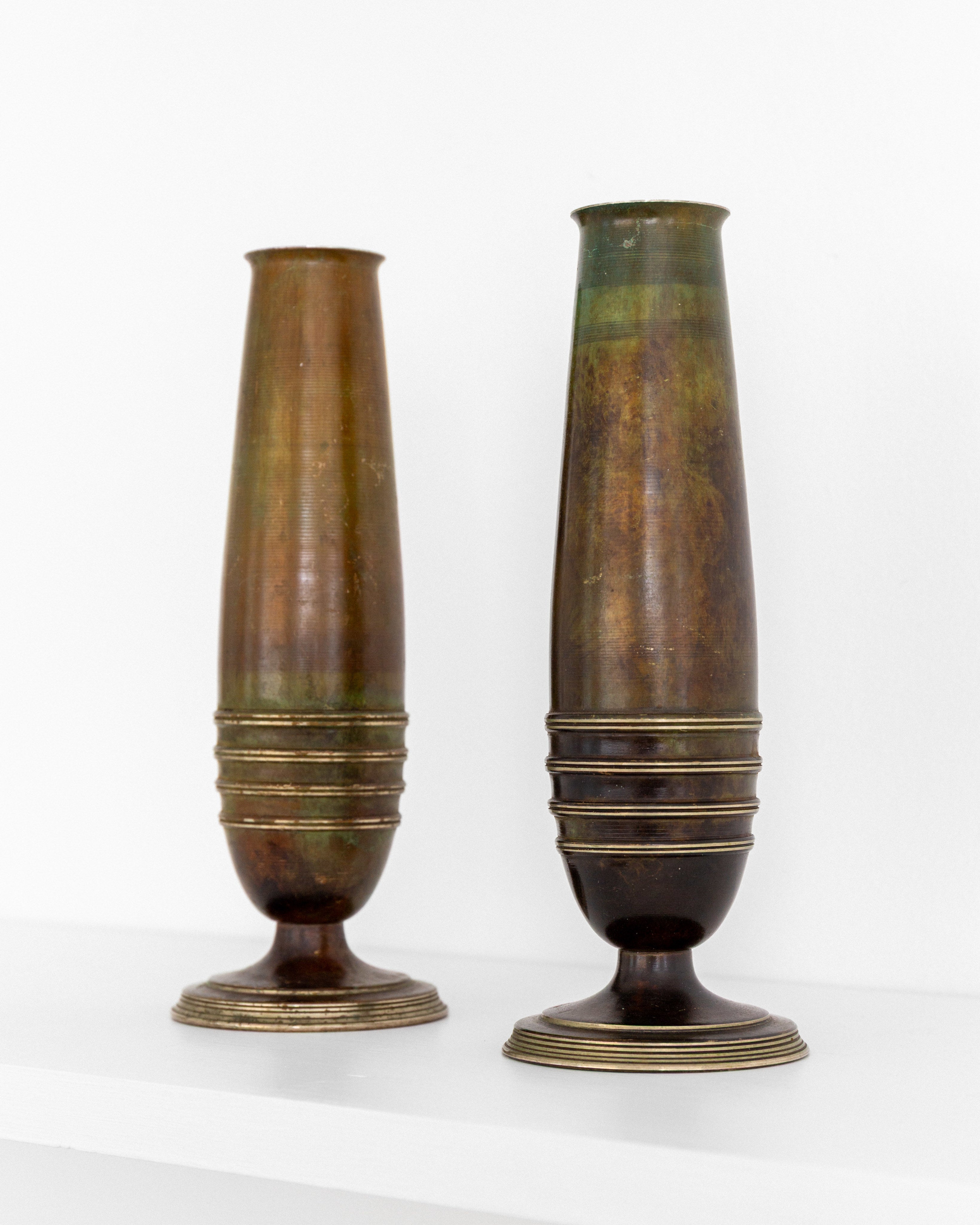 Pair of Modernist Brass and Bronze Vases — side angle showing detailed textures
