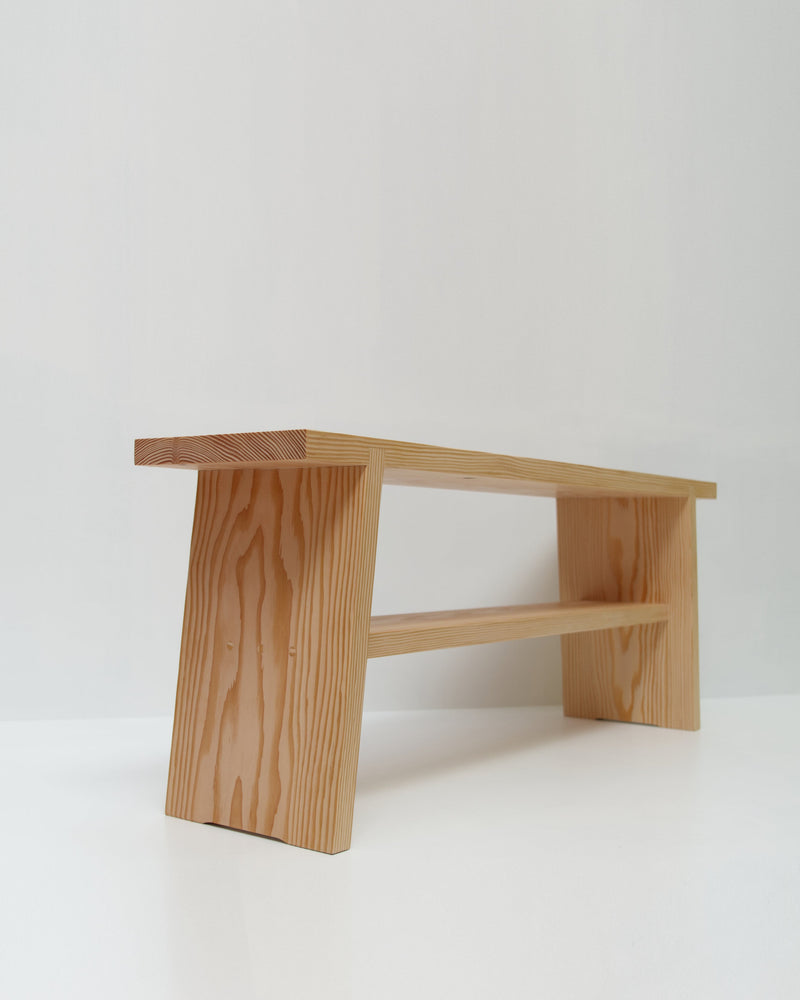 A' Bench — angled view of natural wood finish