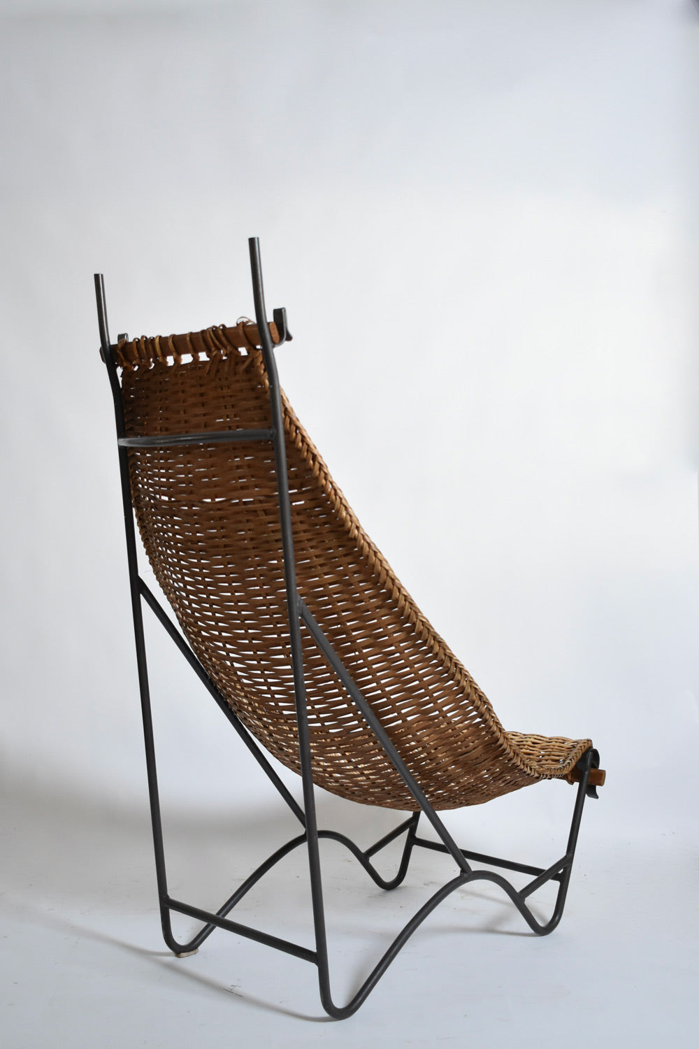 Wrought iron and rattan armchair, 1950s — close-up