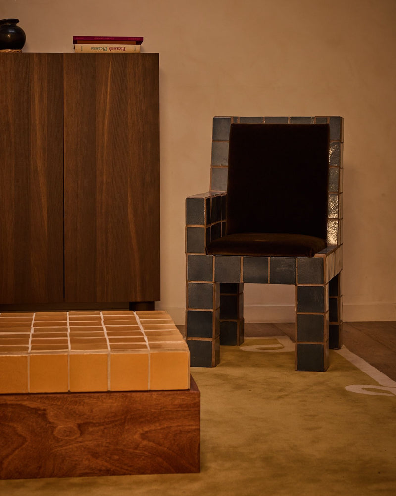 Jura tiled accent chair in modern interior setting