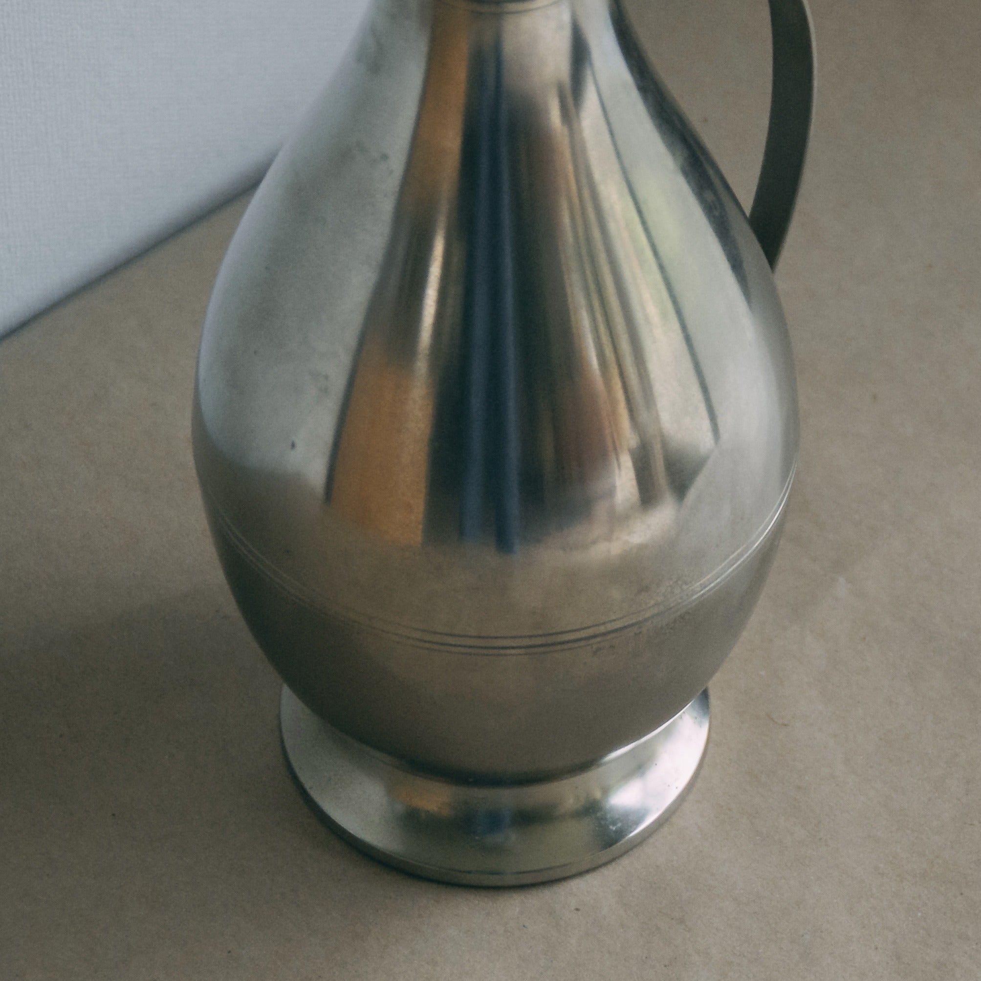 Jeka Tiel Pewter Pitcher — lifestyle setting