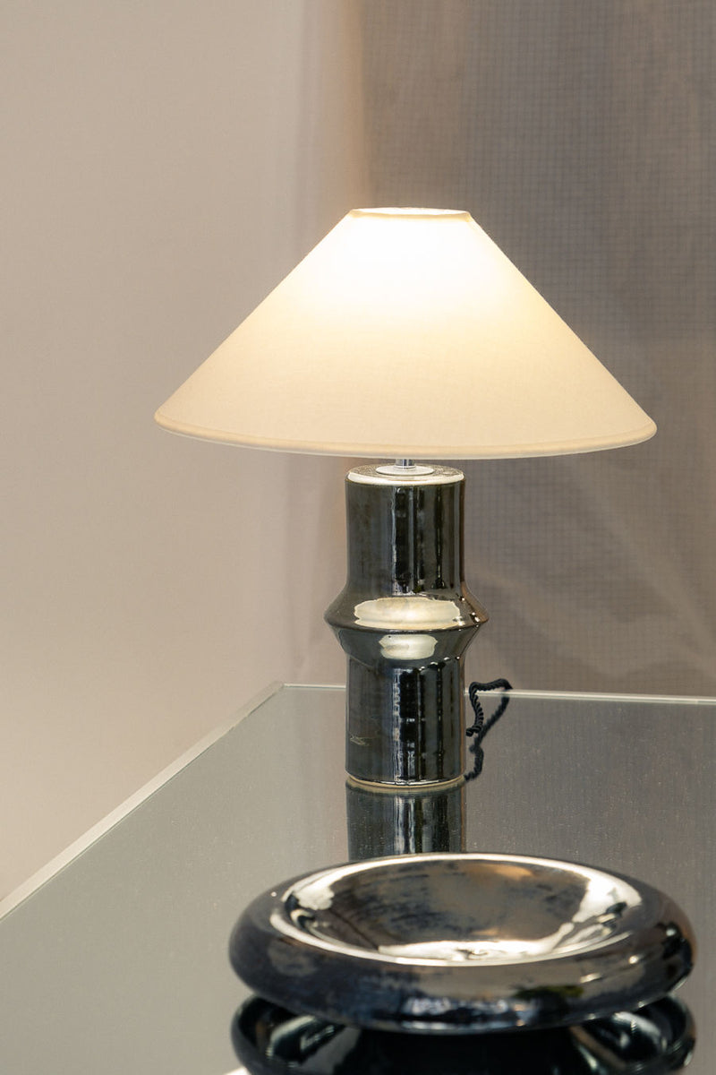 Alix' Table Lamp in Chrome — close-up of ceramic base and fabric shade