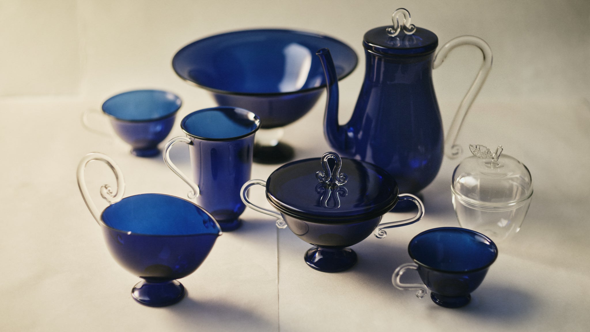 Bell Pot — side angle of blue glass teapot and cups
