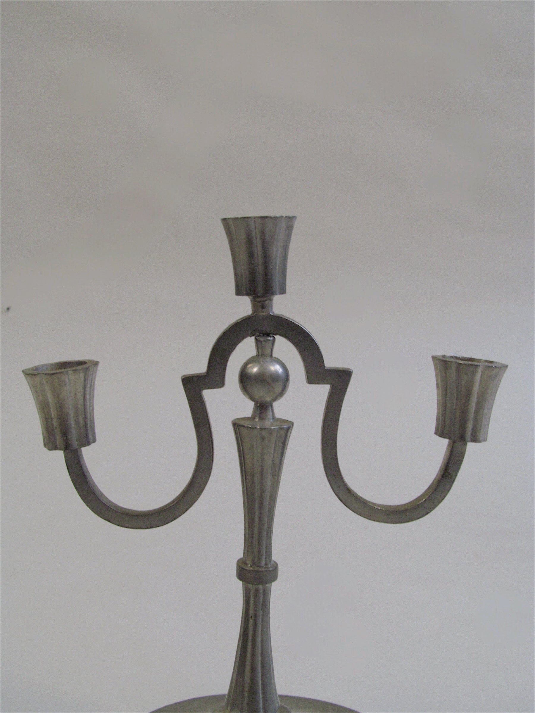 Swedish Grace Candlesticks — side angle showing brushed metal finish