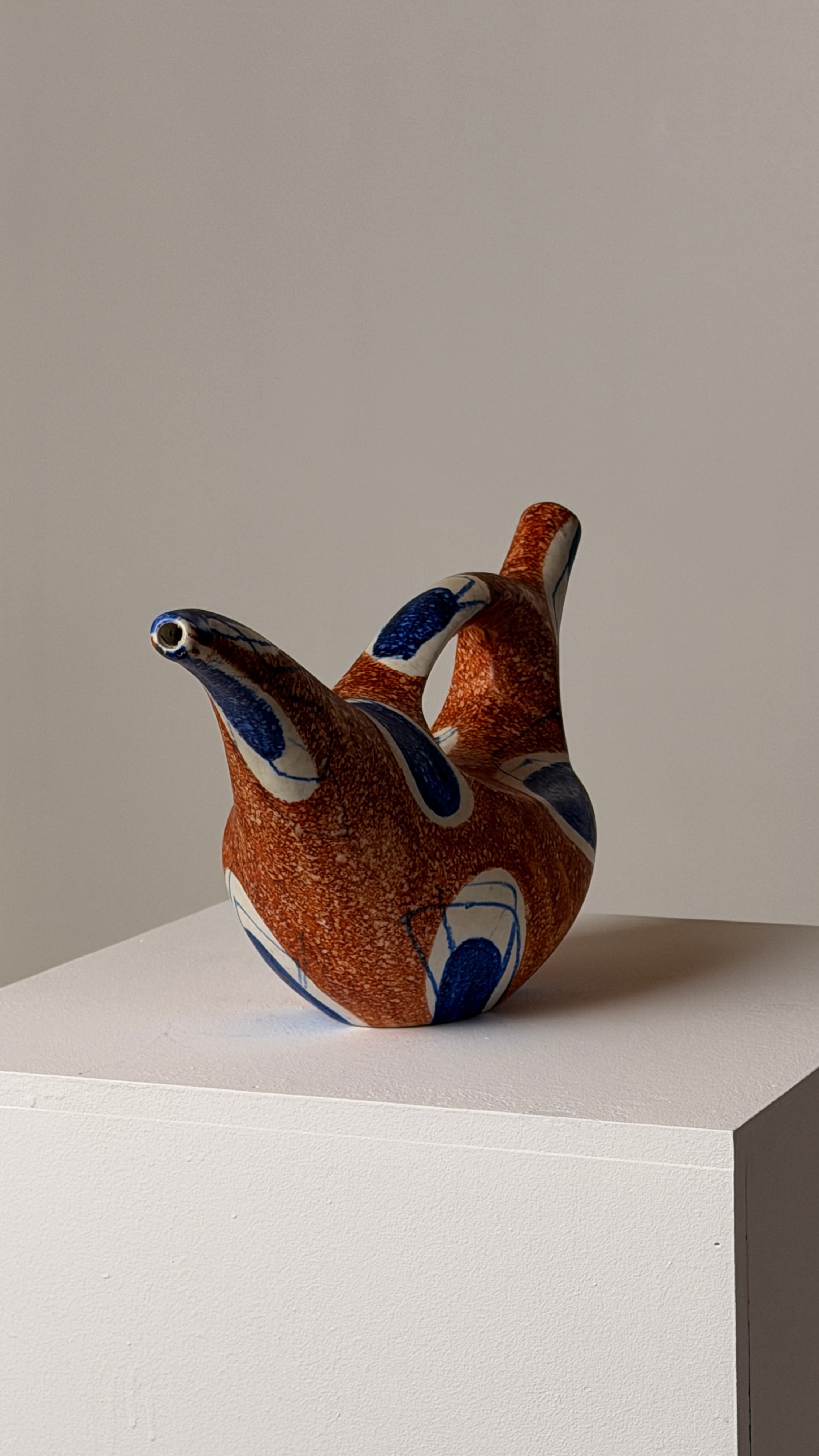 Ceramic Pitcher, Italy, circa 1950. — angled view on white pedestal