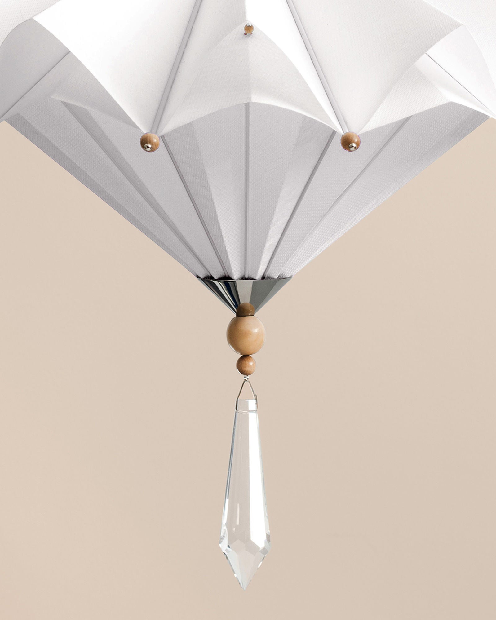 Harlequin pendant light detail showing wooden beads and crystal drop